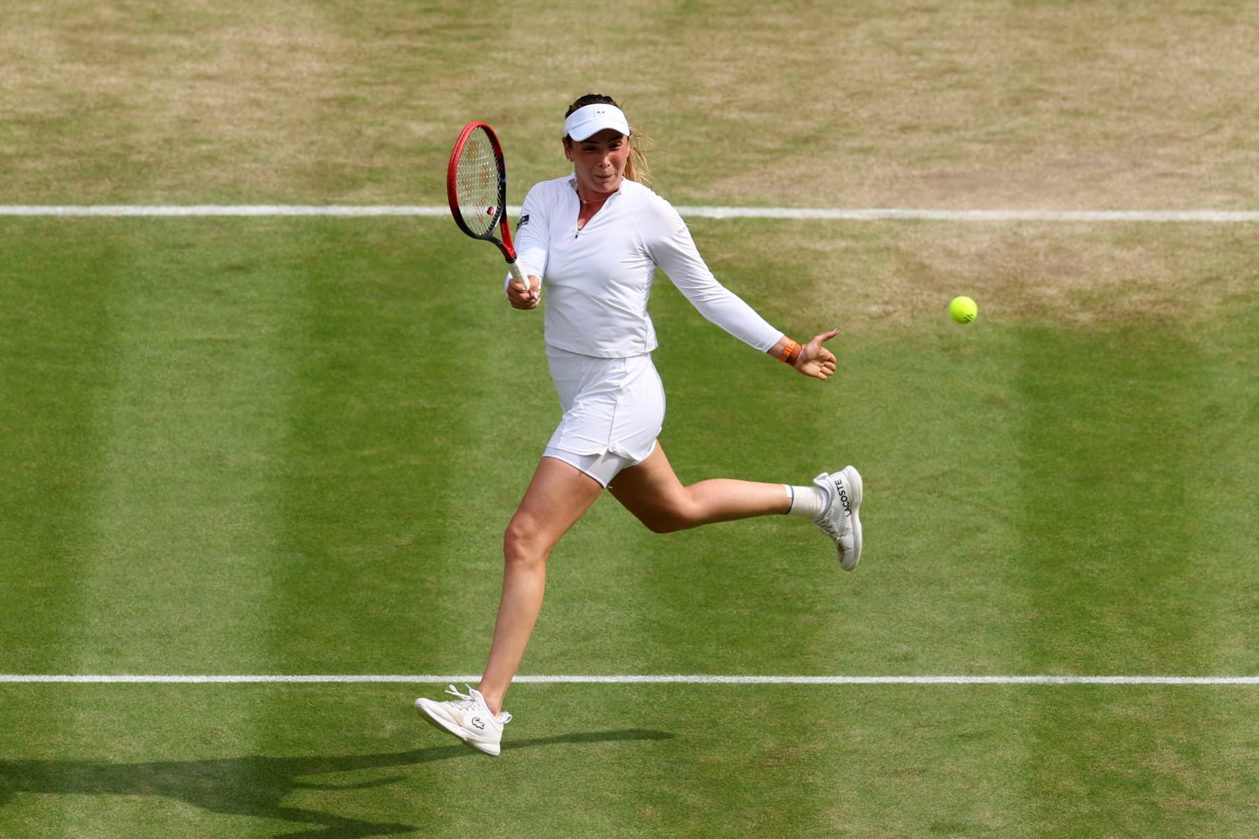 LONDON, ENGLAND - JULY 11: Donna Vekic of Croatia plays a forehand against Jasmine Paolini of Italy in the Ladies' Singles Semi-Final match during day eleven of The Championships Wimbledon 2024 at All England Lawn Tennis and Croquet Club on July 11, 2024 in London, England. (Photo by Julian Finney/Getty Images)