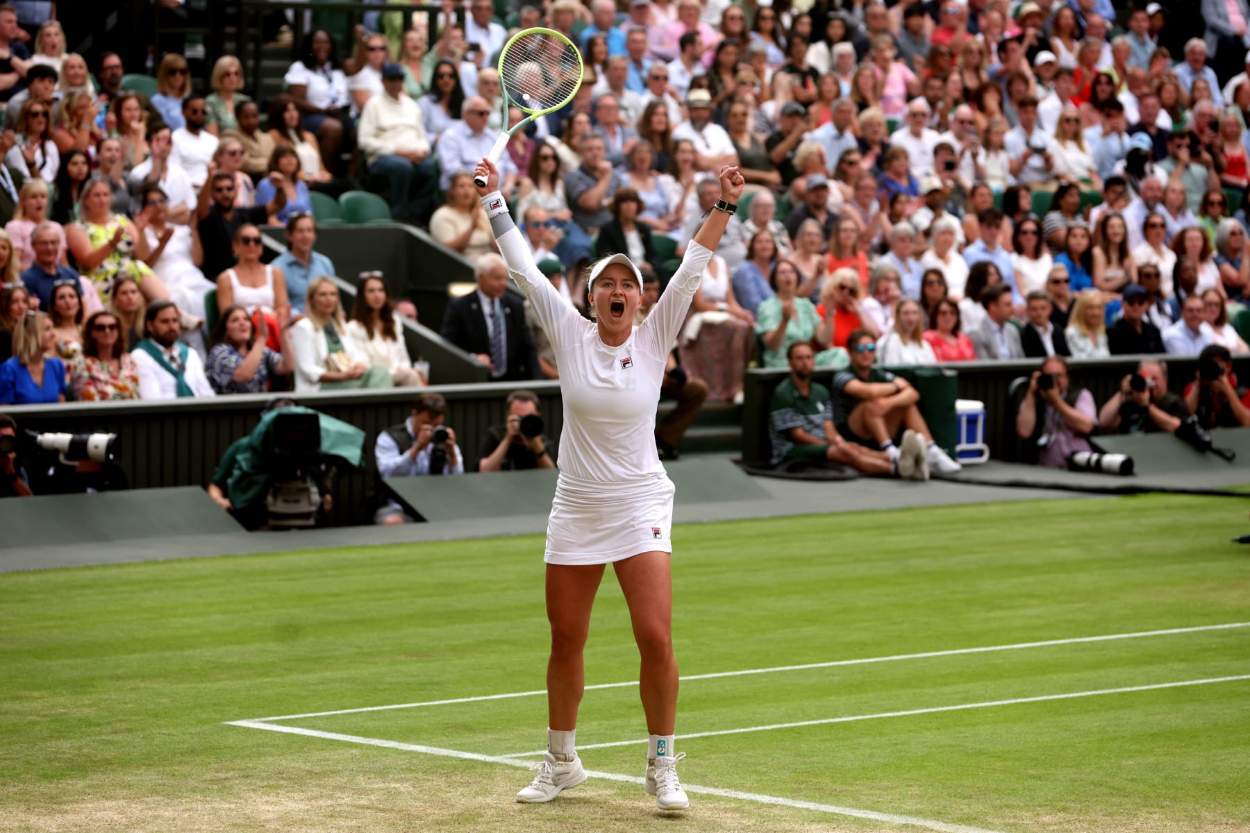 LONDON, ENGLAND - JULY 11: Barbora Krejcikova of Czechia celebrates winning match point against Elena Rybakina of Kazakhstan in the Ladies' Singles Semi-Final match during day eleven of The Championships Wimbledon 2024 at All England Lawn Tennis and Croquet Club on July 11, 2024 in London, England. (Photo by Clive Brunskill/Getty Images)