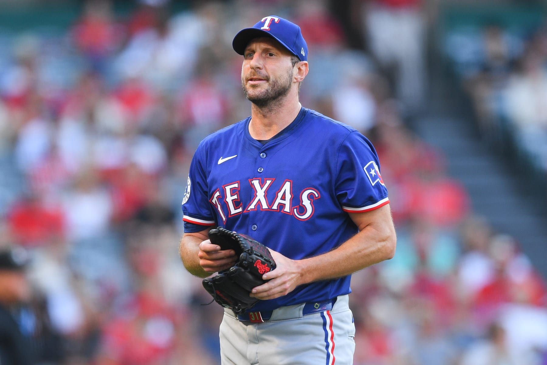ANAHEIM, CA - JULY 09: Texas Rangers pitcher Max Scherzer (31) walks off the mound during the MLB game between the Texas Rangers and the Los Angeles Angels of Anaheim on July 9, 2024 at Angel Stadium of Anaheim in Anaheim, CA. (Photo by Brian Rothmuller/Icon Sportswire via Getty Images)
