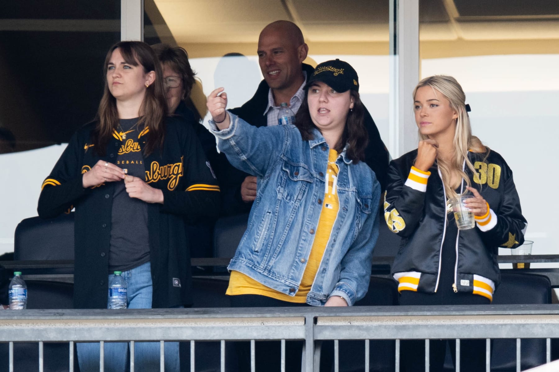 PITTSBURGH, PA - MAY 11:   Guests of Paul Skenes #30 of the Pittsburgh Pirates including Olivia 'Livvy' Dunne look on from their seats during the game between the Chicago Cubs and the Pittsburgh Pirates at PNC Park on Saturday, May 11, 2024 in Pittsburgh, Pennsylvania. (Photo by Joe Sargent/MLB Photos via Getty Images)