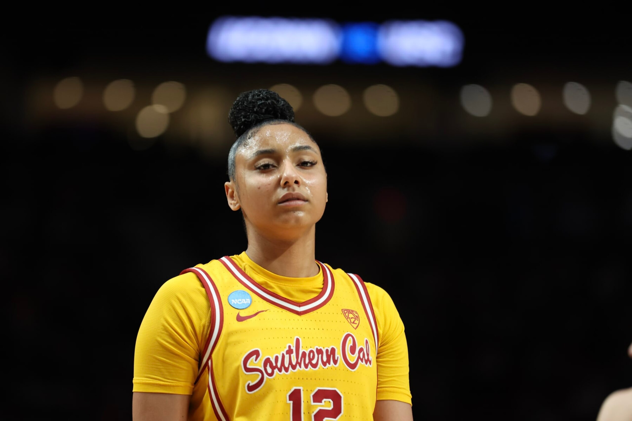 PORTLAND, OREGON - APRIL 01: JuJu Watkins #12 of the USC Trojans reacts after a play during the second half against the Connecticut Huskies in the Elite 8 round of the NCAA Women's Basketball Tournament at Moda Center on April 01, 2024 in Portland, Oregon. (Photo by Steph Chambers/Getty Images) PORTLAND, OREGON - APRIL 01: JuJu Watkins #12 of the USC Trojans reacts after a play during the second half against the Connecticut Huskies in the Elite 8 round of the NCAA Women's Basketball Tournament at Moda Center on April 01, 2024 in Portland, Oregon. (Photo by Steph Chambers/Getty Images)