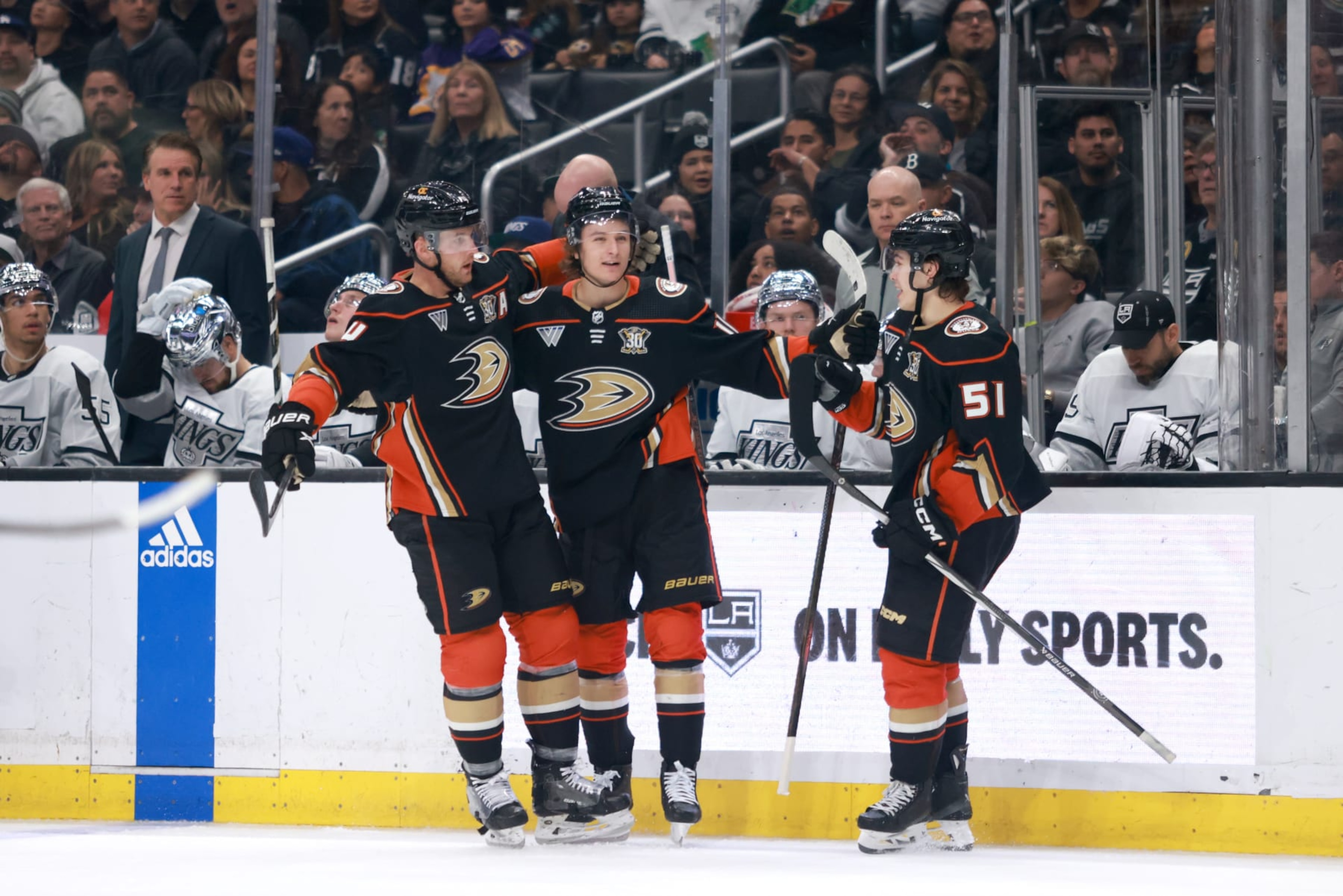 LOS ANGELES, CALIFORNIA - APRIL 13: Trevor Zegras #11, Olen Zellweger #51 and Cam Fowler #4 of the Anaheim Ducks celebrate a goal in the third period during the game against the Los Angeles Kings at Crypto.com Arena on April 13, 2024 in Los Angeles, California. (Photo by Nicole Vasquez/NHLI via Getty Images) LOS ANGELES, CALIFORNIA - APRIL 13: Trevor Zegras #11, Olen Zellweger #51 and Cam Fowler #4 of the Anaheim Ducks celebrate a goal in the third period during the game against the Los Angeles Kings at Crypto.com Arena on April 13, 2024 in Los Angeles, California. (Photo by Nicole Vasquez/NHLI via Getty Images)