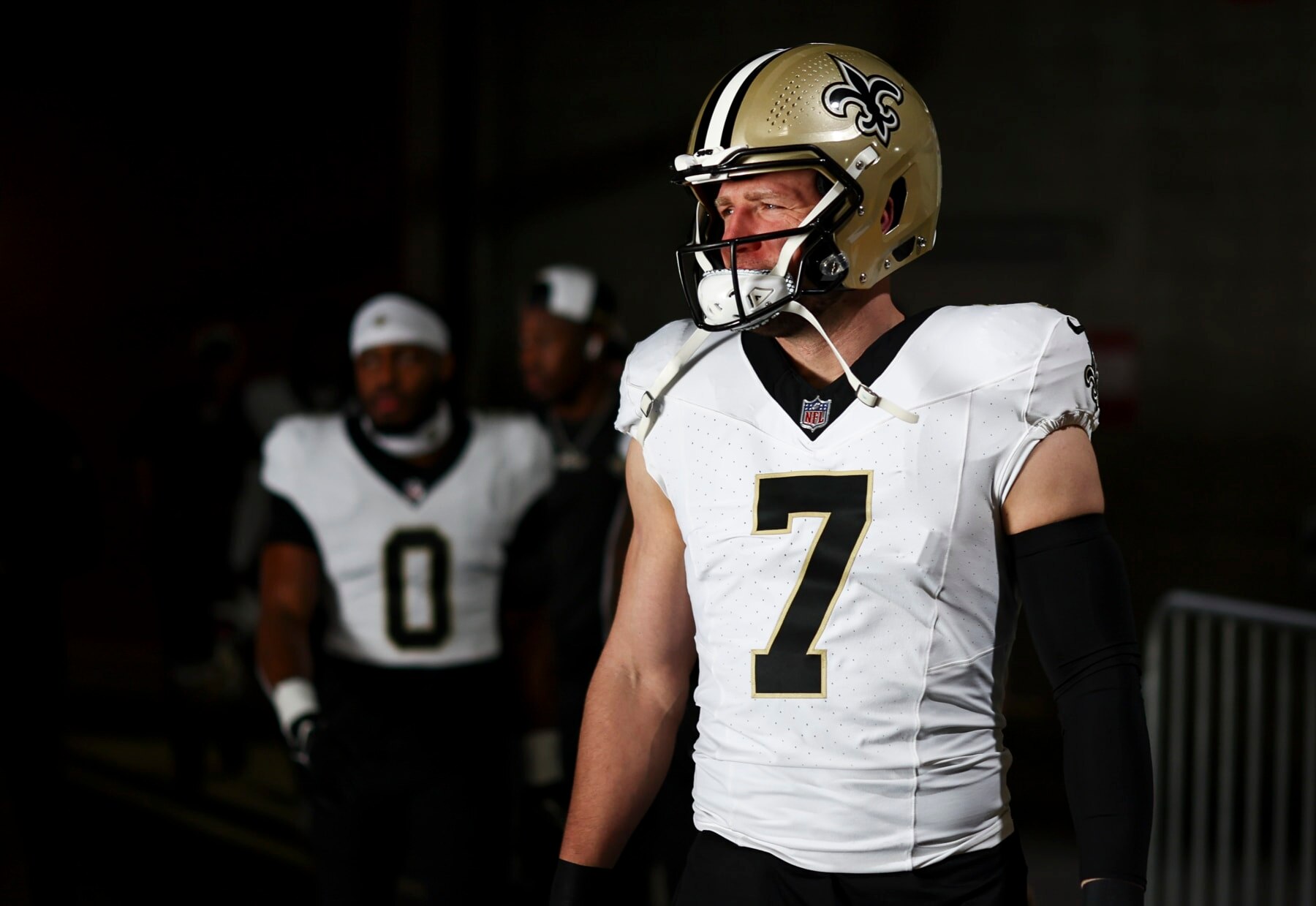 TAMPA, FL - DECEMBER 31: Taysom Hill #7 of the New Orleans Saints walks through the tunnel prior to an NFL football game against the Tampa Bay Buccaneers at Raymond James Stadium on December 31, 2023 in Tampa, Florida. (Photo by Kevin Sabitus/Getty Images)