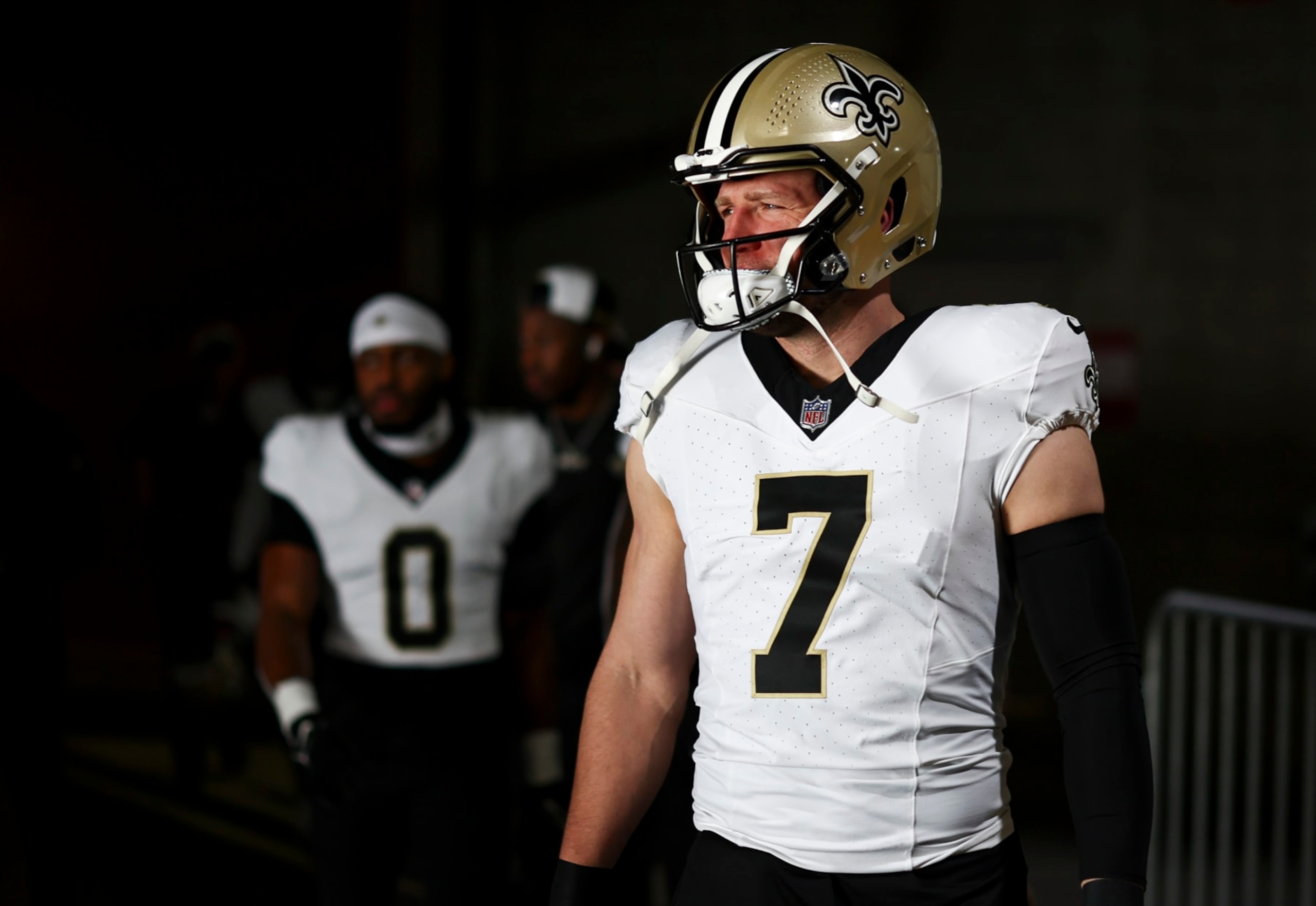 TAMPA, FL - DECEMBER 31: Taysom Hill #7 of the New Orleans Saints walks through the tunnel prior to an NFL football game against the Tampa Bay Buccaneers at Raymond James Stadium on December 31, 2023 in Tampa, Florida. (Photo by Kevin Sabitus/Getty Images)