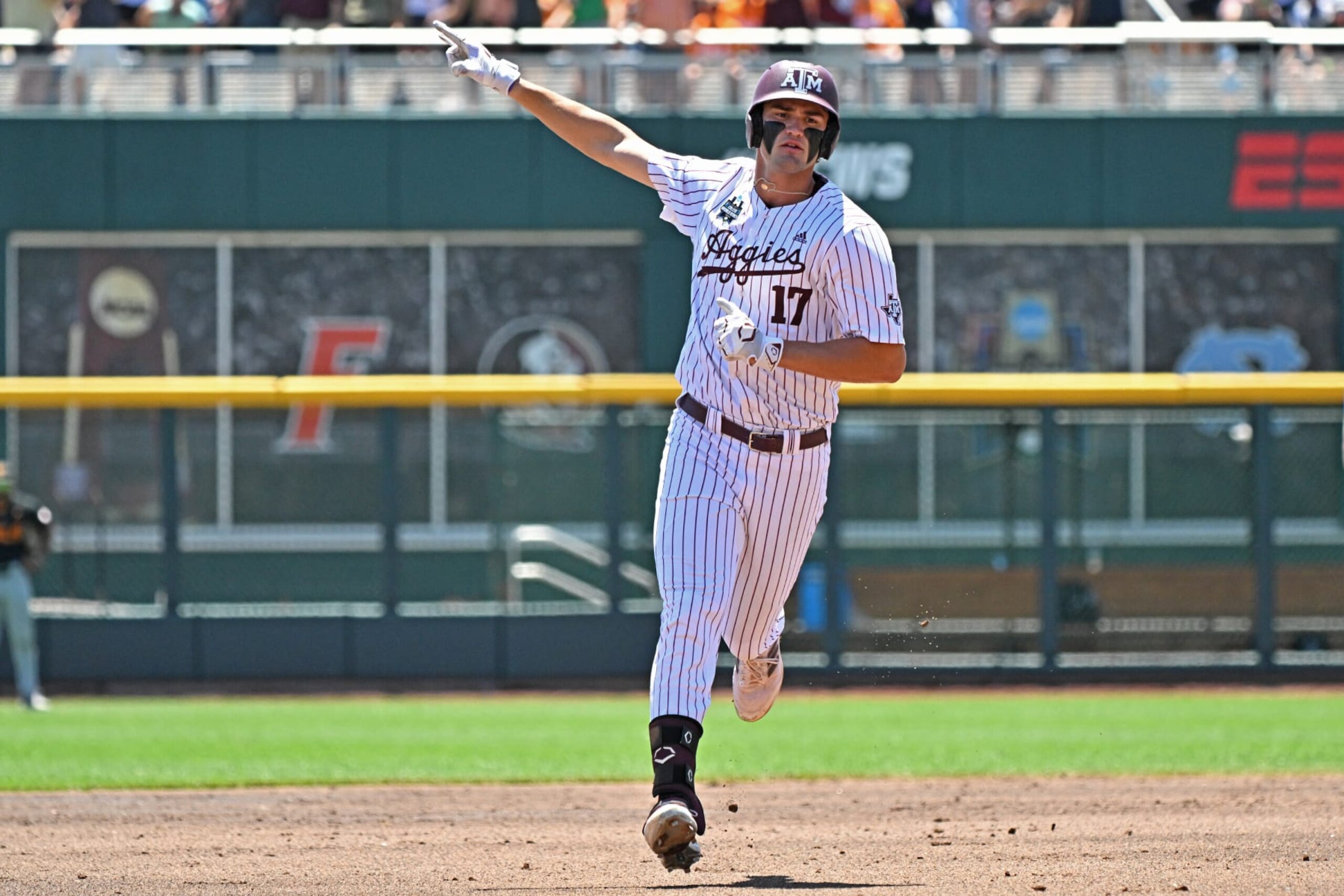 OMAHA, NE - JUNE 23: Jace Laviolette #17 of the Texas A&M Aggies reacts after hitting a solo home run in the first inning against the Tennessee Volunteers during the NCAA Division I Baseball Championship on June 23, 2024 at Charles Schwab Field in Omaha, Nebraska. (Photo by Peter Aiken/Getty Images) OMAHA, NE - JUNE 23: Jace Laviolette #17 of the Texas A&M Aggies reacts after hitting a solo home run in the first inning against the Tennessee Volunteers during the NCAA Division I Baseball Championship on June 23, 2024 at Charles Schwab Field in Omaha, Nebraska. (Photo by Peter Aiken/Getty Images)
