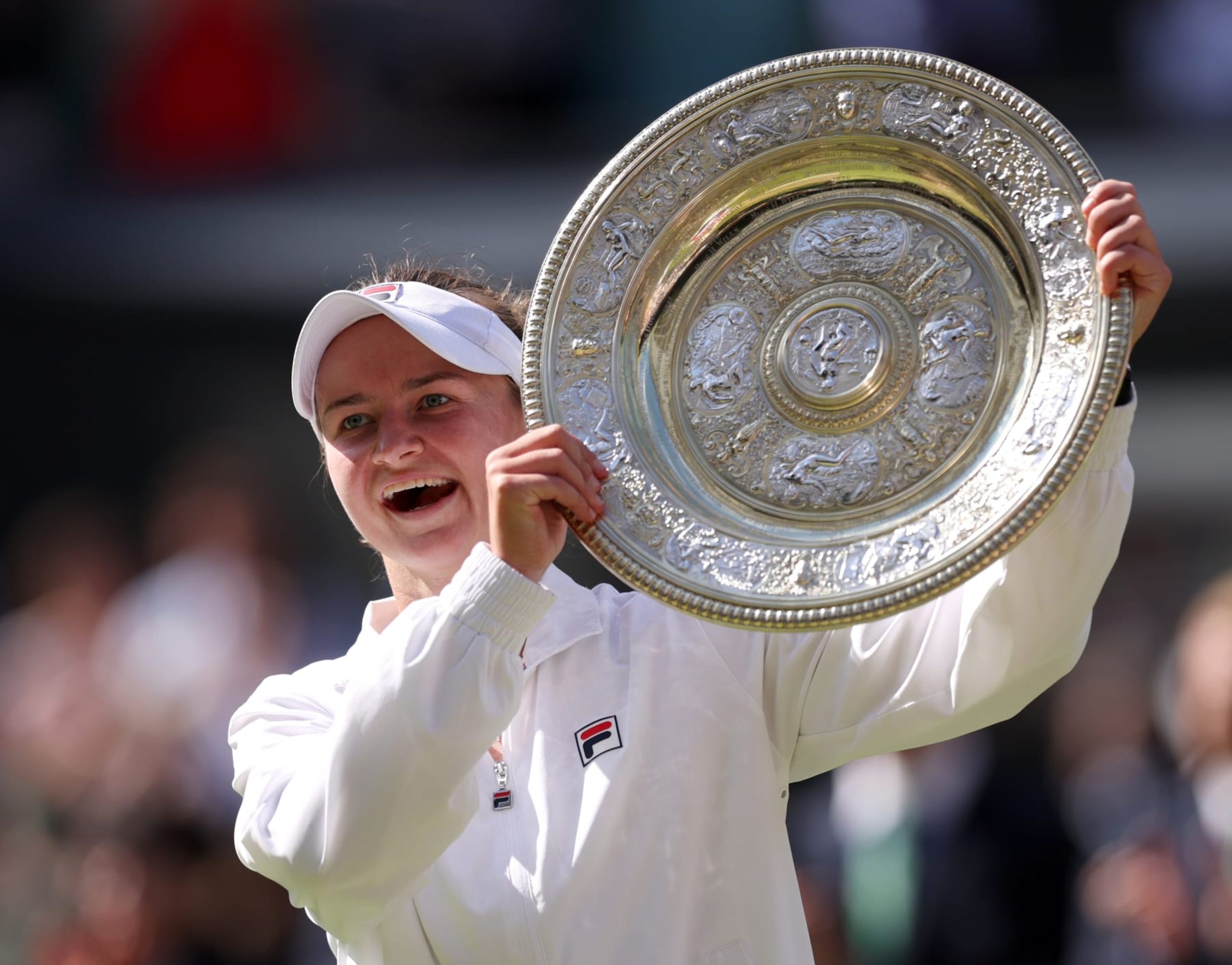 LONDON, ENGLAND - JULY 13: Barbora Krejcikova of Czechia poses with the Ladies' Singles Trophy following victory against Jasmine Paolini of Italy during her Ladies' Singles Final match during day thirteen of The Championships Wimbledon 2024 at All England Lawn Tennis and Croquet Club on July 13, 2024 in London, England. (Photo by Clive Brunskill/Getty Images) LONDON, ENGLAND - JULY 13: Barbora Krejcikova of Czechia poses with the Ladies' Singles Trophy following victory against Jasmine Paolini of Italy during her Ladies' Singles Final match during day thirteen of The Championships Wimbledon 2024 at All England Lawn Tennis and Croquet Club on July 13, 2024 in London, England. (Photo by Clive Brunskill/Getty Images)