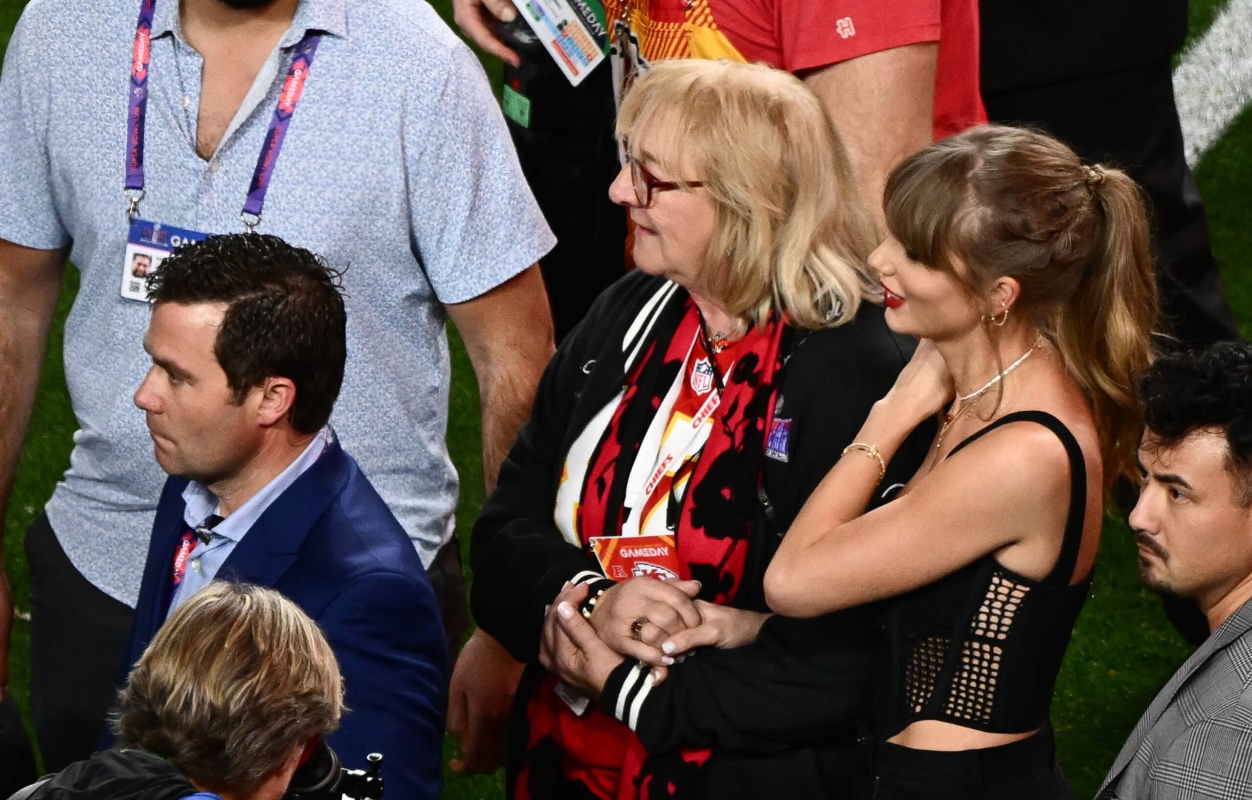 US singer-songwriter Taylor Swift and Donna Kelce stand on the field after Super Bowl LVIII between the Kansas City Chiefs and the San Francisco 49ers at Allegiant Stadium in Las Vegas, Nevada, February 11, 2024. (Photo by Patrick T. Fallon / AFP) (Photo by PATRICK T. FALLON/AFP via Getty Images)