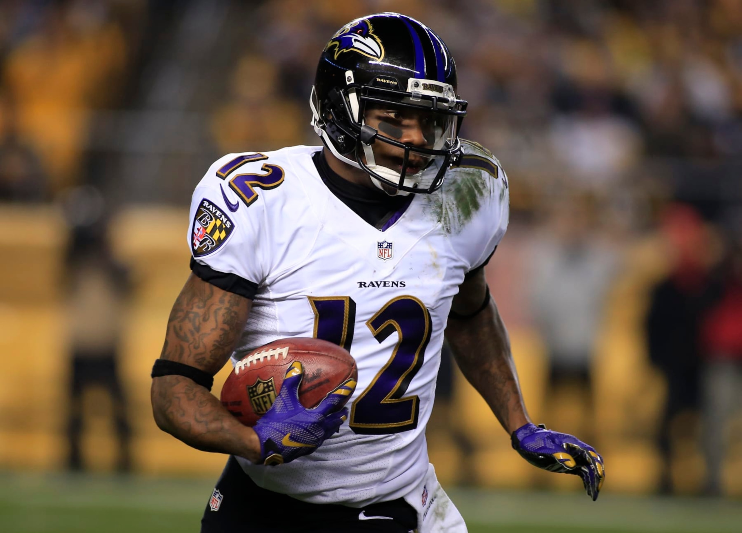 PITTSBURGH, PA - JANUARY 03:  Jacoby Jones #12 of the Baltimore Ravens plays against the Pittsburgh Steelers during the Wild Card game on January 3, 2015 at Heinz Field in Pittsburgh, Pennsylvania.  (Photo by Justin K. Aller/Getty Images) 