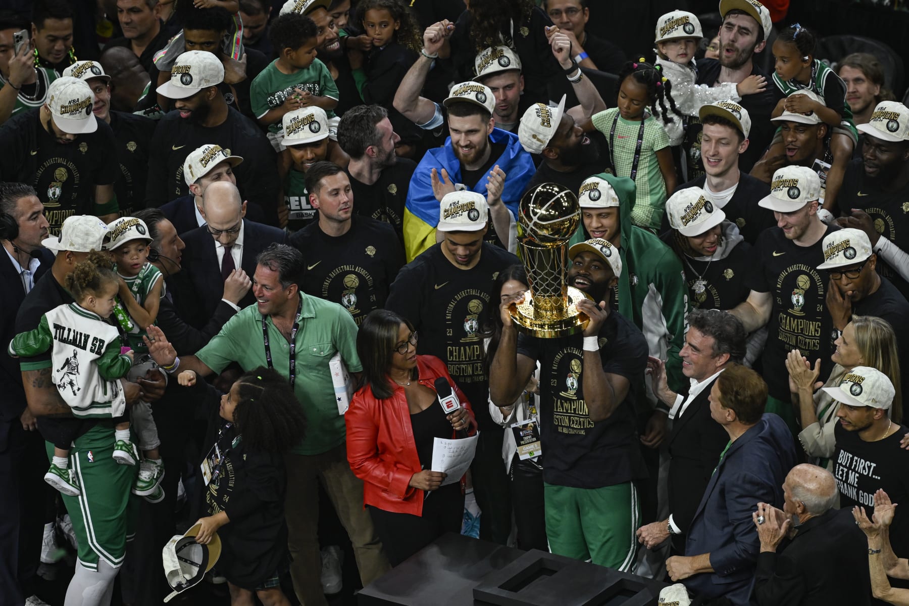 BOSTON, MA, UNITED STATES - JUNE 17: Jaylen Brown of the Boston Celtics celebrates with the Larry O'Brien Trophy after Boston Celtics winning the National Basketball Association (NBA) finals game against Dallas Mavericks at the TD Garden in Boston, Massachusetts, United States on June 17, 2024. (Photo by Celal Gunes/Anadolu via Getty Images)