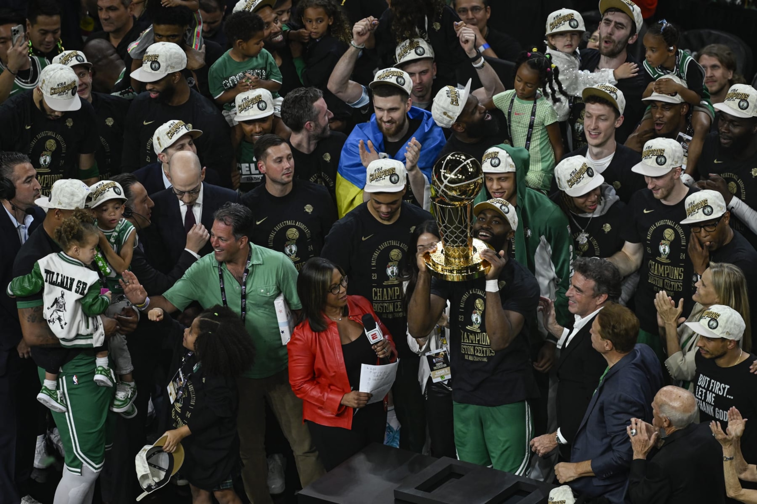 BOSTON, MA, UNITED STATES - JUNE 17: Jaylen Brown of the Boston Celtics celebrates with the Larry O'Brien Trophy after Boston Celtics winning the National Basketball Association (NBA) finals game against Dallas Mavericks at the TD Garden in Boston, Massachusetts, United States on June 17, 2024. (Photo by Celal Gunes/Anadolu via Getty Images)