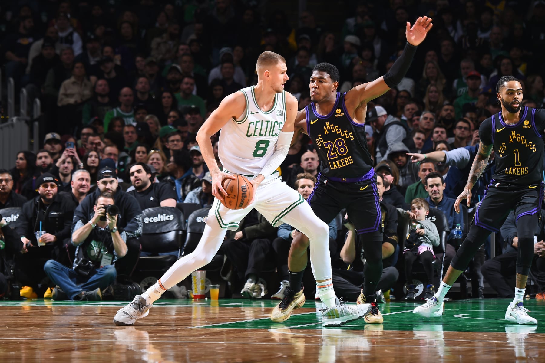 BOSTON, MA - FEBRUARY 1: Kristaps Porzingis #8 of the Boston Celtics handles the ball during the game  against the Los Angeles Lakers on February 1, 2024 at the TD Garden in Boston, Massachusetts. NOTE TO USER: User expressly acknowledges and agrees that, by downloading and or using this photograph, User is consenting to the terms and conditions of the Getty Images License Agreement. Mandatory Copyright Notice: Copyright 2024 NBAE  (Photo by Brian Babineau/NBAE via Getty Images)