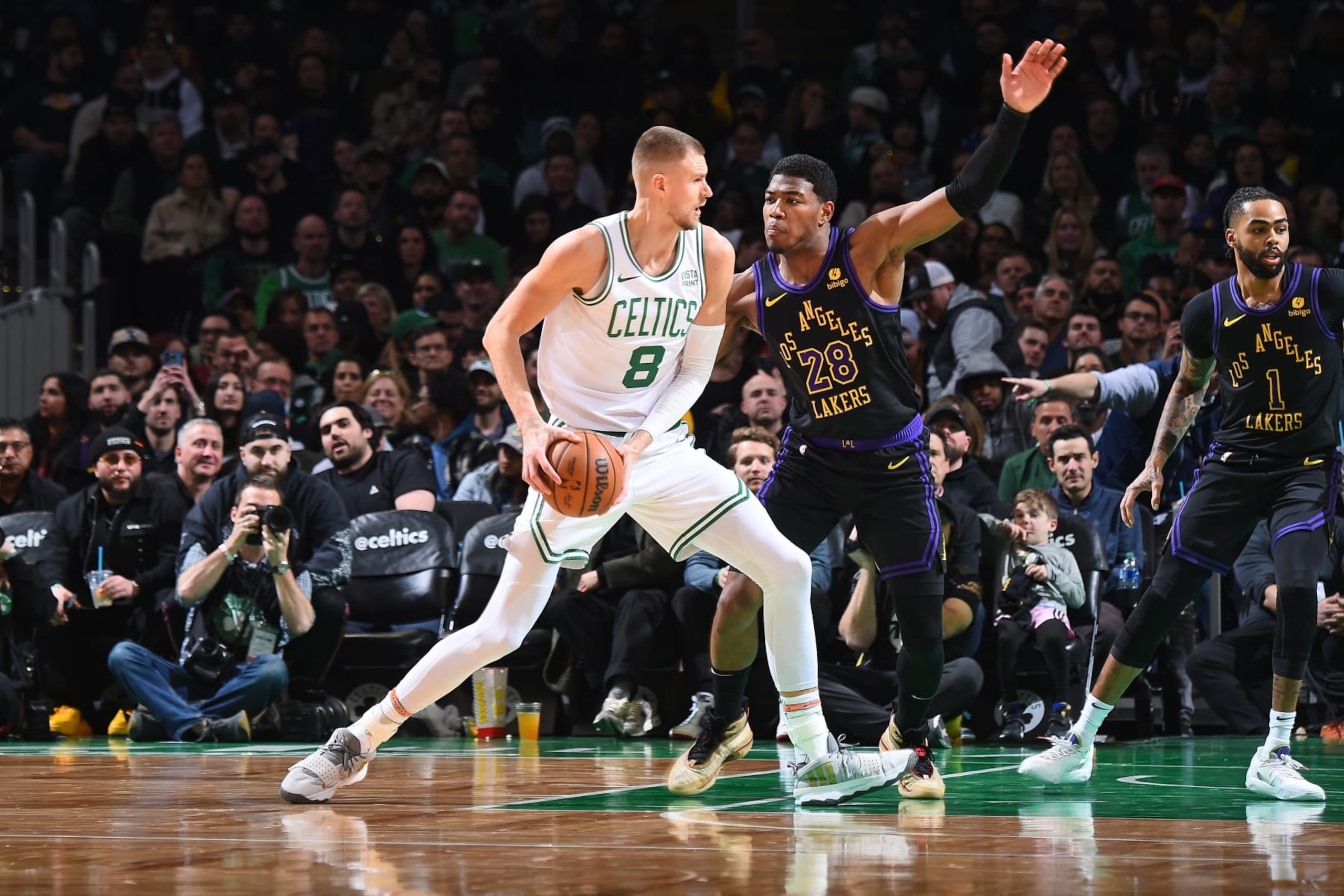 BOSTON, MA - FEBRUARY 1: Kristaps Porzingis #8 of the Boston Celtics handles the ball during the game  against the Los Angeles Lakers on February 1, 2024 at the TD Garden in Boston, Massachusetts. NOTE TO USER: User expressly acknowledges and agrees that, by downloading and or using this photograph, User is consenting to the terms and conditions of the Getty Images License Agreement. Mandatory Copyright Notice: Copyright 2024 NBAE  (Photo by Brian Babineau/NBAE via Getty Images)