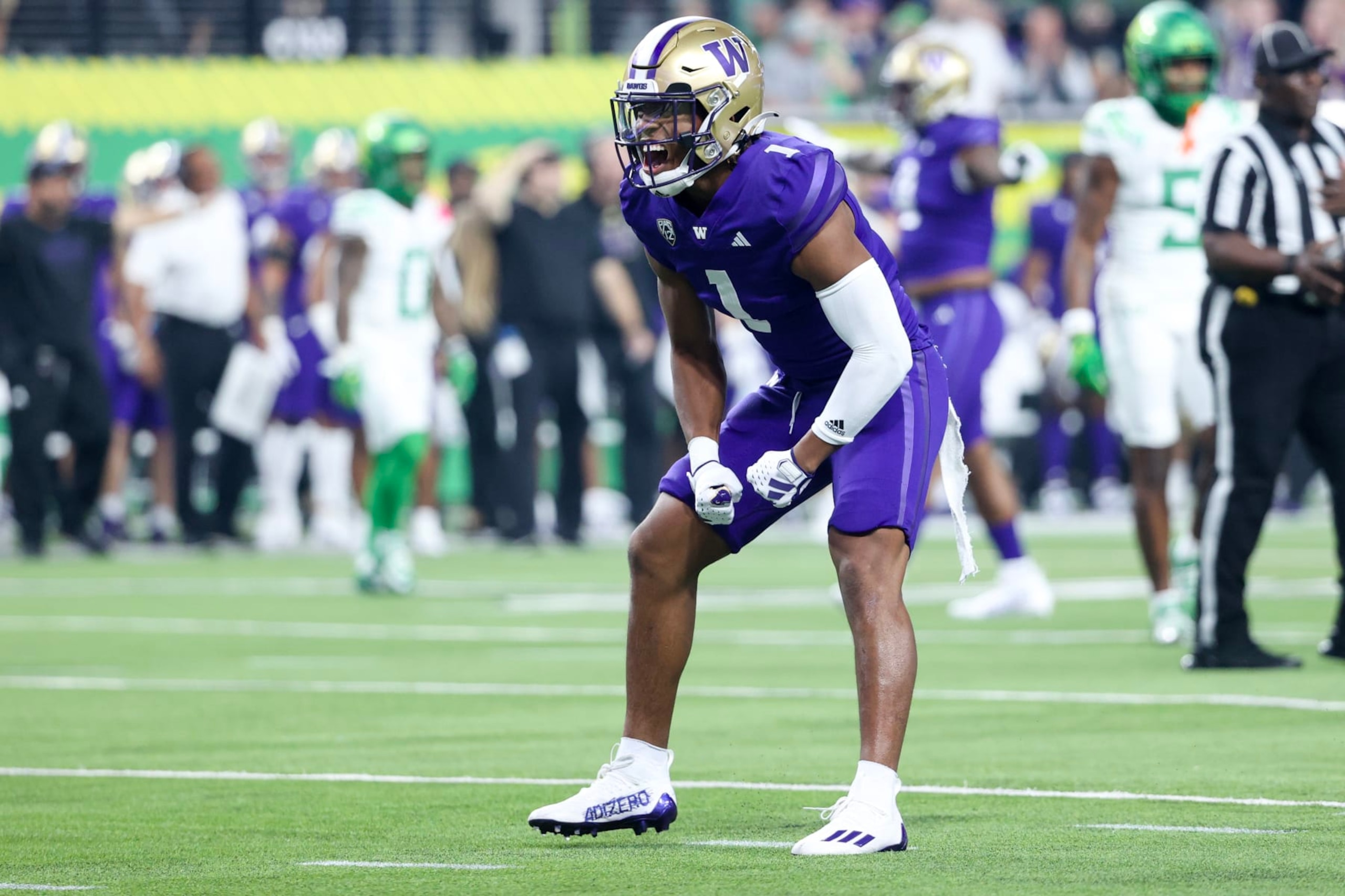 LAS VEGAS, NEVADA - DECEMBER 01: Jabbar Muhammad #1 of the Washington Huskies reacts after a play during the second quarter against the Oregon Ducks during the Pac-12 Championship at Allegiant Stadium on December 01, 2023 in Las Vegas, Nevada. (Photo by Ian Maule/Getty Images) LAS VEGAS, NEVADA - DECEMBER 01: Jabbar Muhammad #1 of the Washington Huskies reacts after a play during the second quarter against the Oregon Ducks during the Pac-12 Championship at Allegiant Stadium on December 01, 2023 in Las Vegas, Nevada. (Photo by Ian Maule/Getty Images)