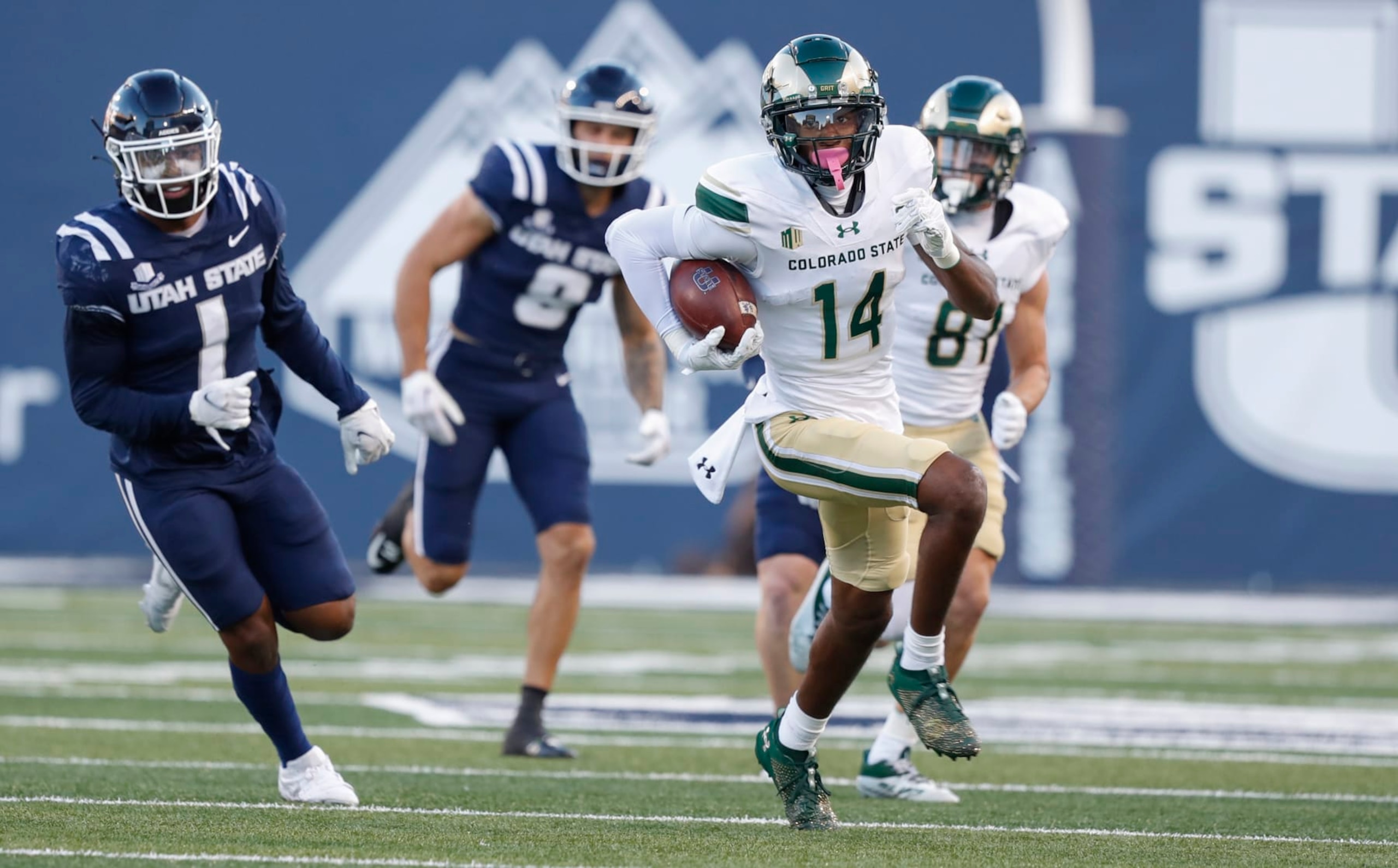 LOGAN, UT - OCTOBER 7: Tory Horton #14 of the Colorado State Rams runs back a punt return for a touchdown against Anthony Switzer #1 of the Utah State Aggies during the first half of their game at Maverik Stadium October 7, 2023 in Logan, Utah. (Photo by Chris Gardner/Getty Images) LOGAN, UT - OCTOBER 7: Tory Horton #14 of the Colorado State Rams runs back a punt return for a touchdown against Anthony Switzer #1 of the Utah State Aggies during the first half of their game at Maverik Stadium October 7, 2023 in Logan, Utah. (Photo by Chris Gardner/Getty Images)