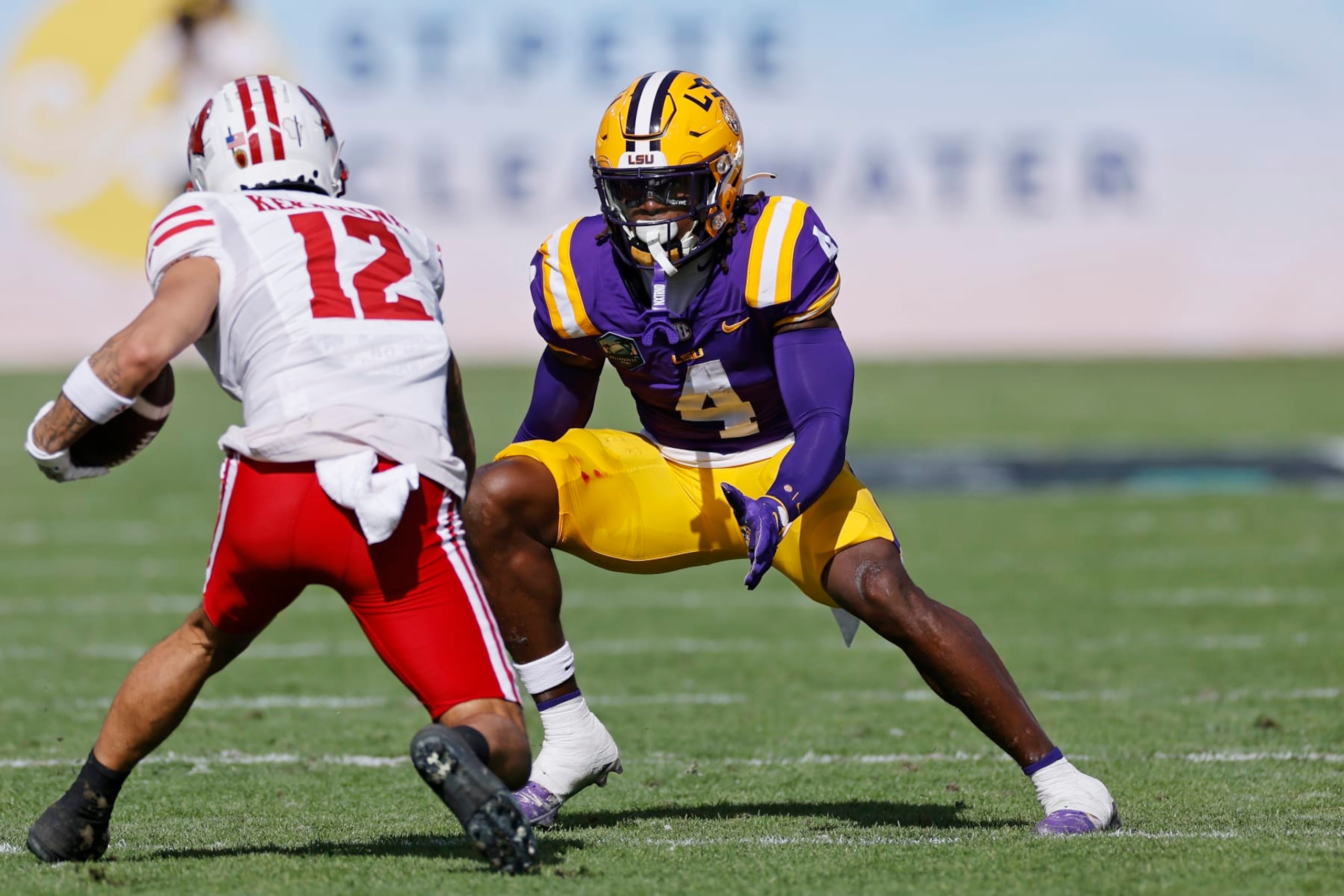TAMPA, FL - JANUARY 01: LSU Tigers linebacker Harold Perkins Jr. (4) looks to make a tackle during the ReliaQuest Bowl against the Wisconsin Badgers on January 1, 2024 at Raymond James Stadium in Tampa, Florida. (Photo by Joe Robbins/Icon Sportswire via Getty Images) TAMPA, FL - JANUARY 01: LSU Tigers linebacker Harold Perkins Jr. (4) looks to make a tackle during the ReliaQuest Bowl against the Wisconsin Badgers on January 1, 2024 at Raymond James Stadium in Tampa, Florida. (Photo by Joe Robbins/Icon Sportswire via Getty Images)