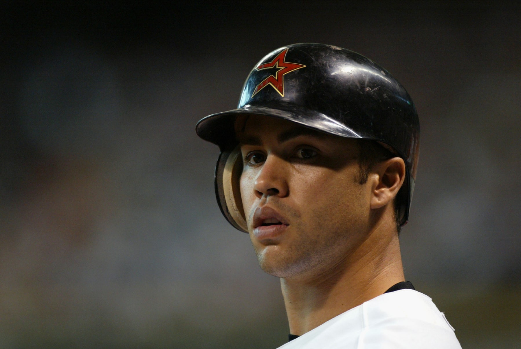 HOUSTON - OCTOBER 9:  Outfielder Carlos Beltran #15 of the Houston Astros watches game three of the National League Divisional Series against the Atlanta Braves at Minute Maid Park on October 9, 2004 in Houston, Texas.  The Astros won 8-5.  (Photo by Streeter Lecka/Getty Images)