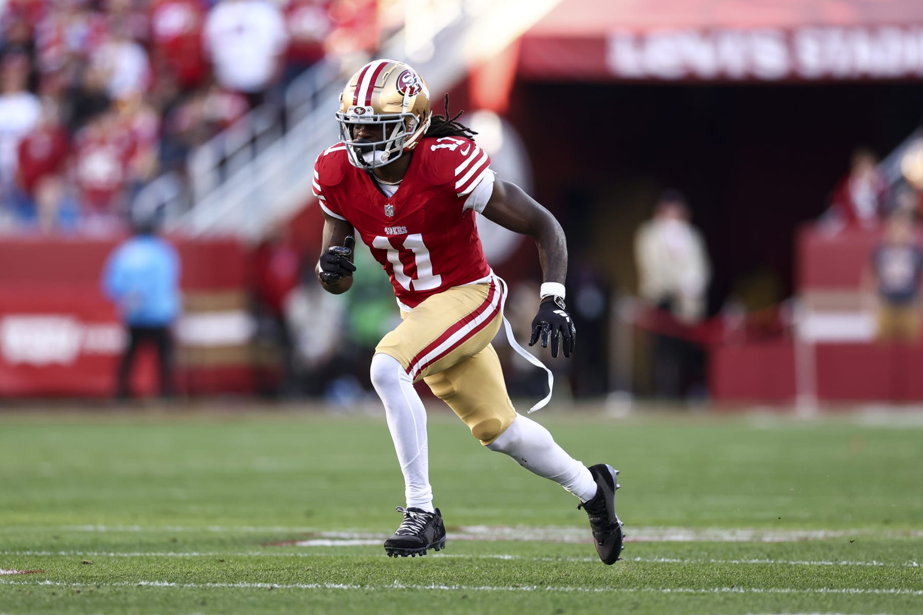 SANTA CLARA, CA - JANUARY 28: Brandon Aiyuk #11 of the San Francisco 49ers runs downfield during the NFC Championship NFL football game against the Detroit Lions at Levi's Stadium on January 28, 2024 in Santa Clara, California. (Photo by Kevin Sabitus/Getty Images)