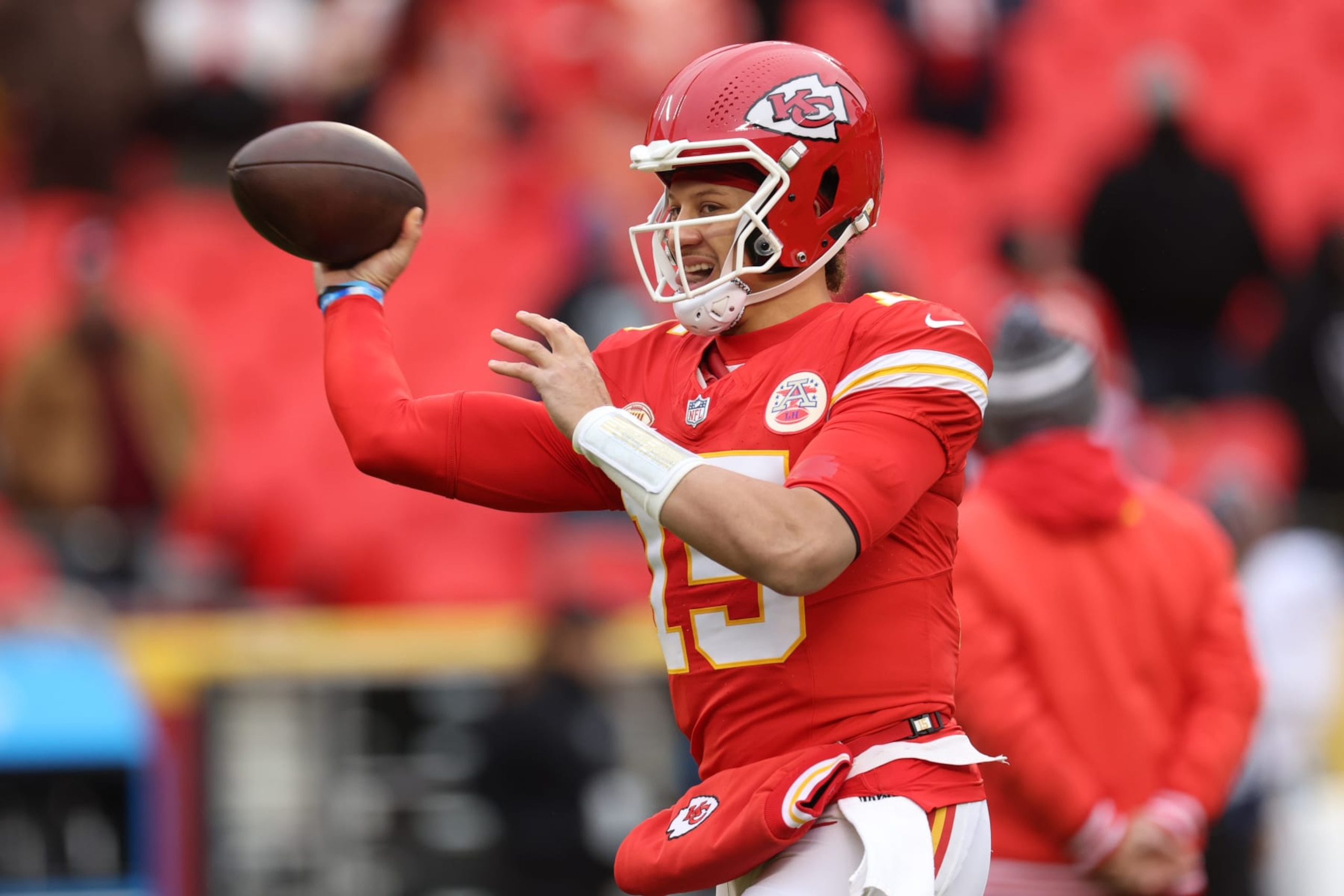 KANSAS CITY, MISSOURI - DECEMBER 25: Patrick Mahomes #15 of the Kansas City Chiefs warms up prior to a game against the Las Vegas Raiders at GEHA Field at Arrowhead Stadium on December 25, 2023 in Kansas City, Missouri. (Photo by Jamie Squire/Getty Images)