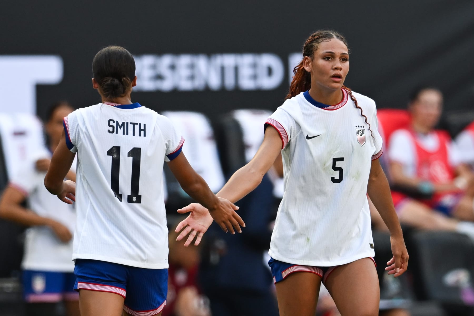 HARRISON, NEW JERSEY - JULY 13: Sophia Smith #11 high-fives Trinity Rodman #5 of the United States during a game between Mexico and USWNT at Red Bull Arena on July 13, 2024 in Harrison, New Jersey. (Photo by Stephen Nadler/ISI Photos/USSF/Getty Images for USSF)