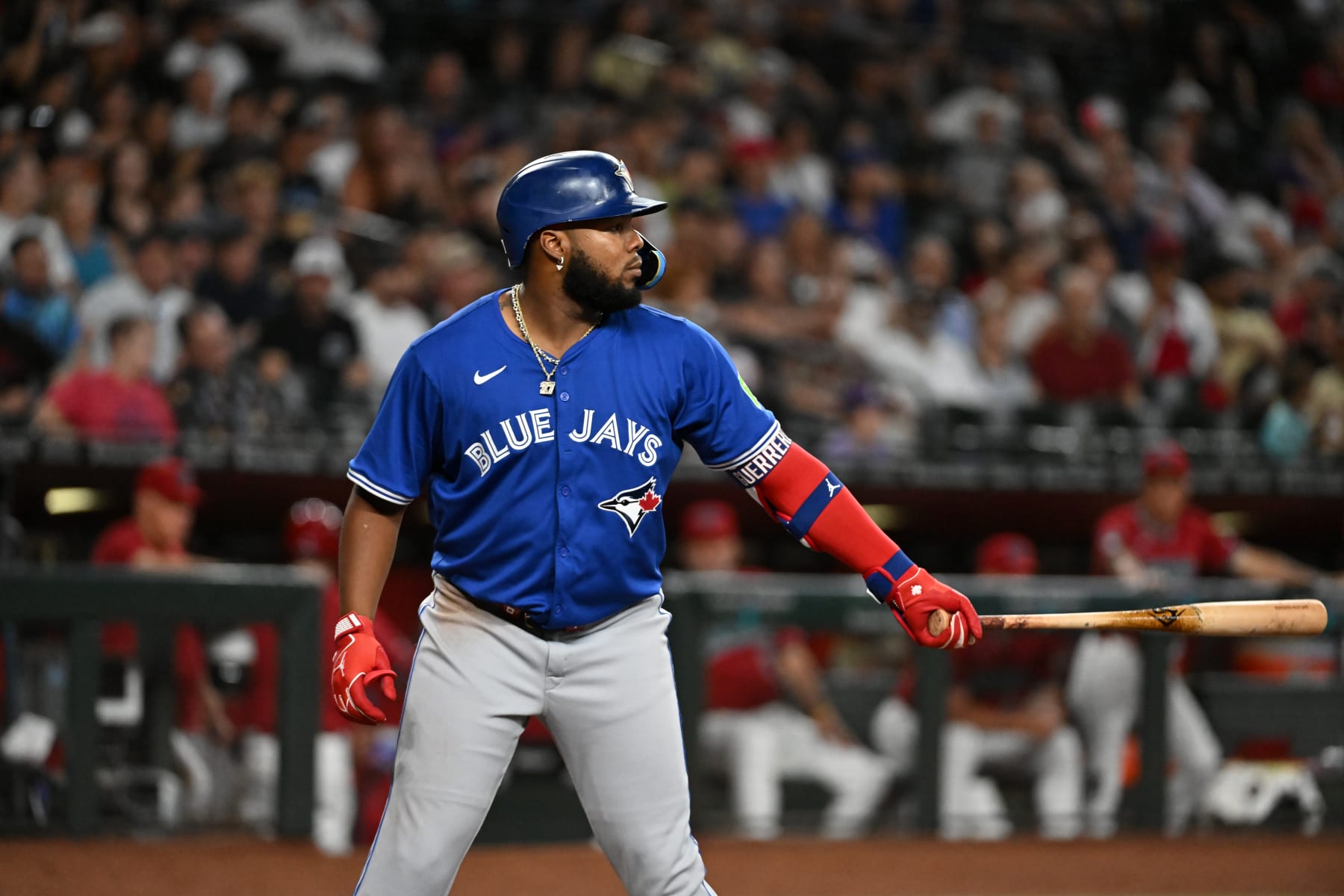 PHOENIX, ARIZONA - JULY 14: Vladimir Guerrero Jr #27 of the Toronto Blue Jays gets ready in the batters box against the Arizona Diamondbacks at Chase Field on July 14, 2024 in Phoenix, Arizona. (Photo by Norm Hall/Getty Images)