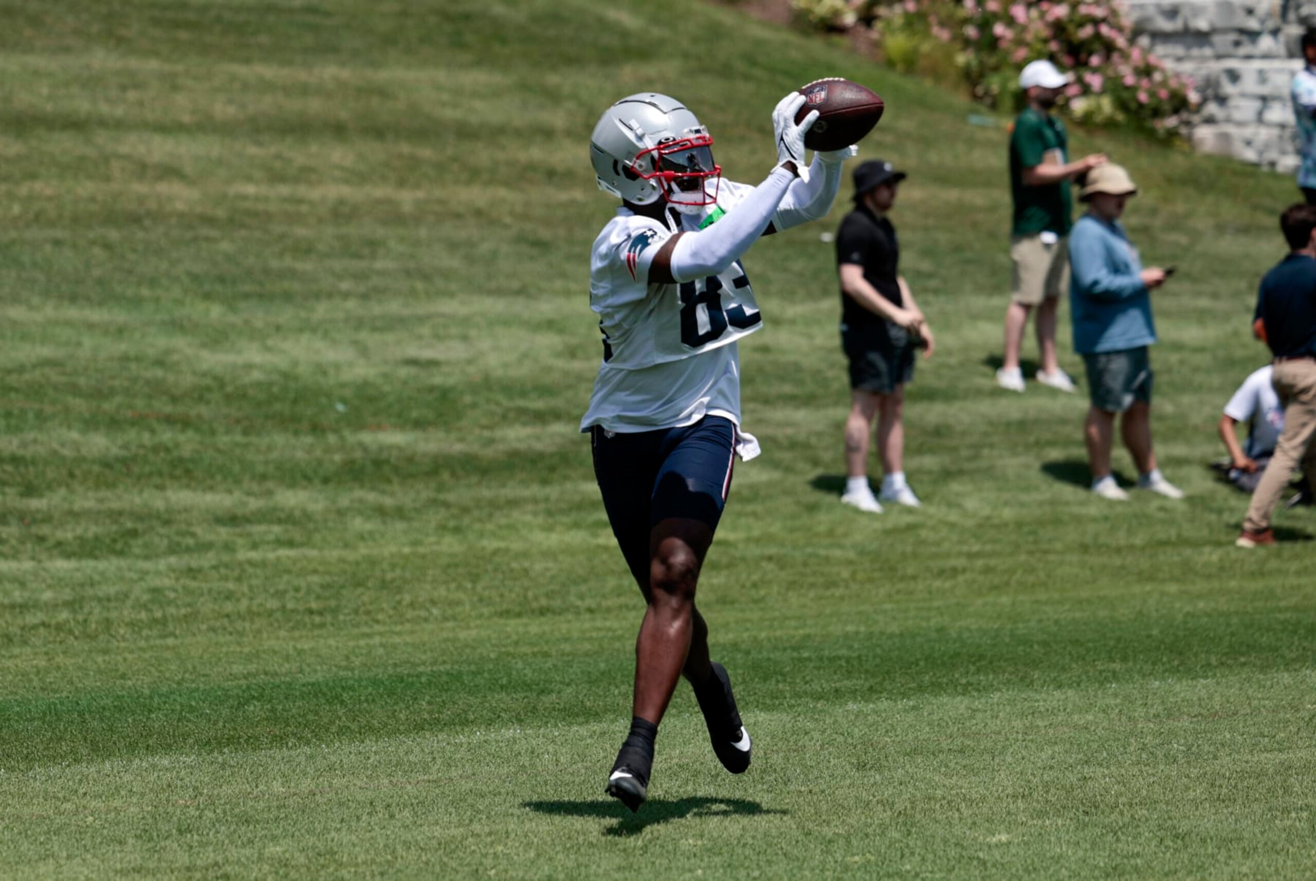 FOXBOROUGH, MA - JUNE 04: New England Patriots wide receiver Jalen Reagor (83) catches the ball during New England Patriots OTA on June 4, 2024, at Gillette Stadium in Foxborough, Massachusetts. (Photo by Fred Kfoury III/Icon Sportswire via Getty Images)