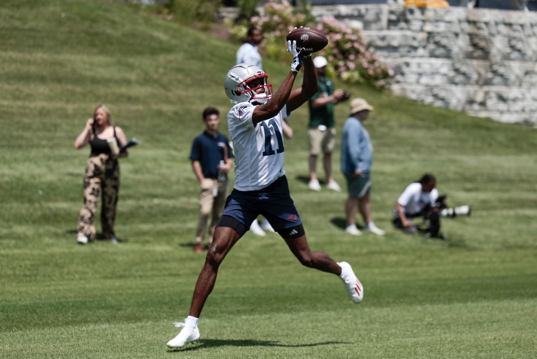 FOXBOROUGH, MA - JUNE 04: New England Patriots wide receiver Tyquan Thornton (11) makes a catch during New England Patriots OTA on June 4, 2024, at Gillette Stadium in Foxborough, Massachusetts. (Photo by Fred Kfoury III/Icon Sportswire via Getty Images)