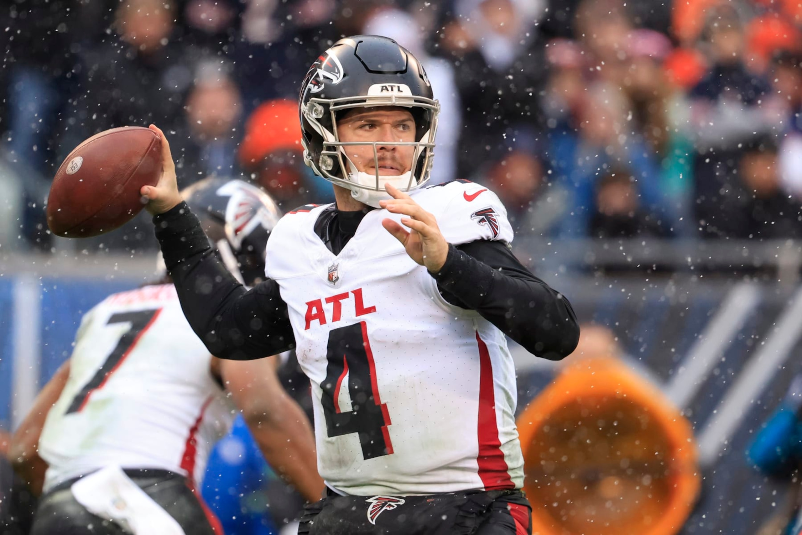CHICAGO, ILLINOIS - DECEMBER 31: Taylor Heinicke #4 of the Atlanta Falcons throws a pass in the game against the Chicago Bears at Soldier Field on December 31, 2023 in Chicago, Illinois. (Photo by Justin Casterline/Getty Images)