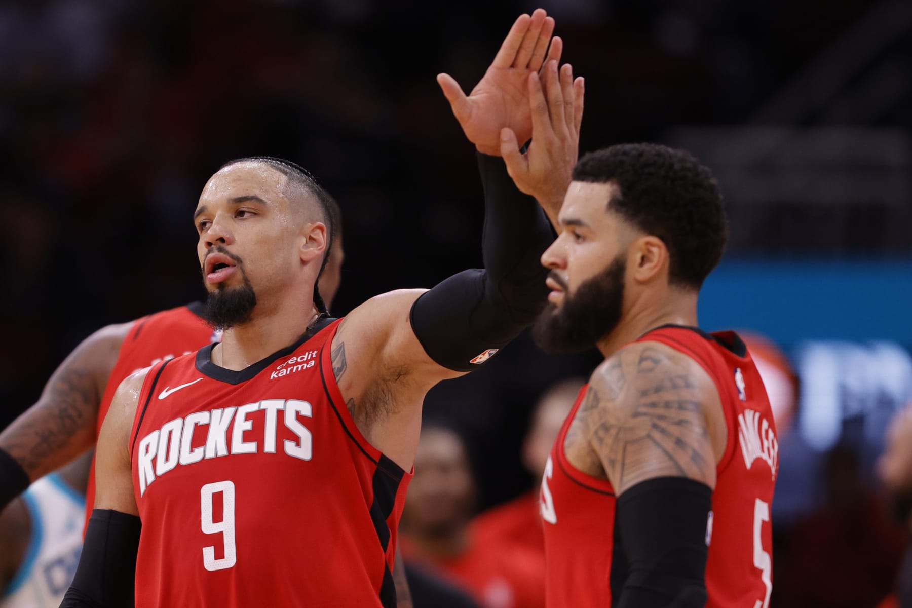HOUSTON, TEXAS - NOVEMBER 01: Dillon Brooks #9 of the Houston Rockets high fives Fred VanVleet#5 of the Houston Rockets during the second half against the Charlotte Hornets at Toyota Center on November 01, 2023 in Houston, Texas. (Photo by Carmen Mandato/Getty Images)