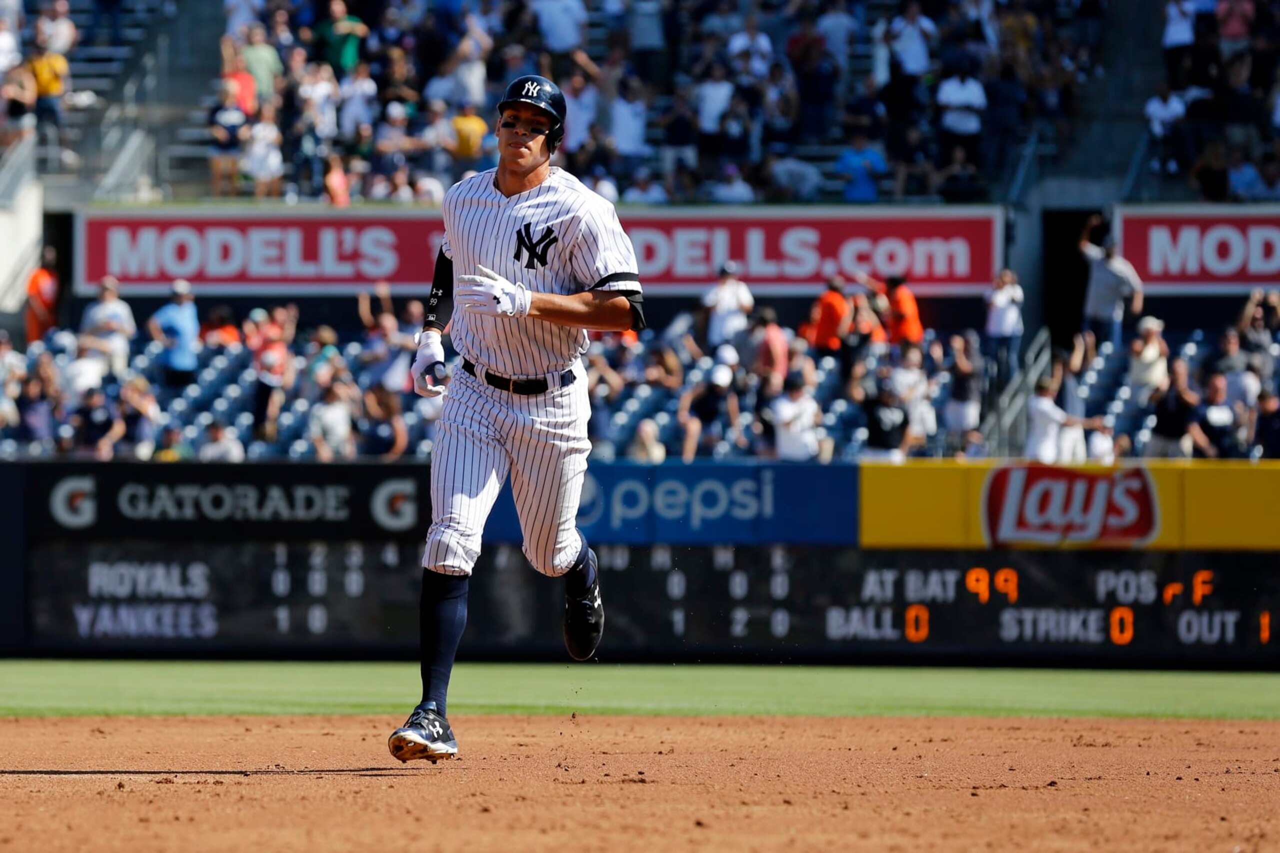 NEW YORK, NY - SEPTEMBER 25: Aaron Judge #99 of the New York Yankees rounds the bases after hitting a two-run home run against the Kansas City Royals during the third inning at Yankee Stadium on September 25, 2017 in the Bronx borough of New York City. The home run was number 49 of the season tying the record. (Photo by Adam Hunger/Getty Images)