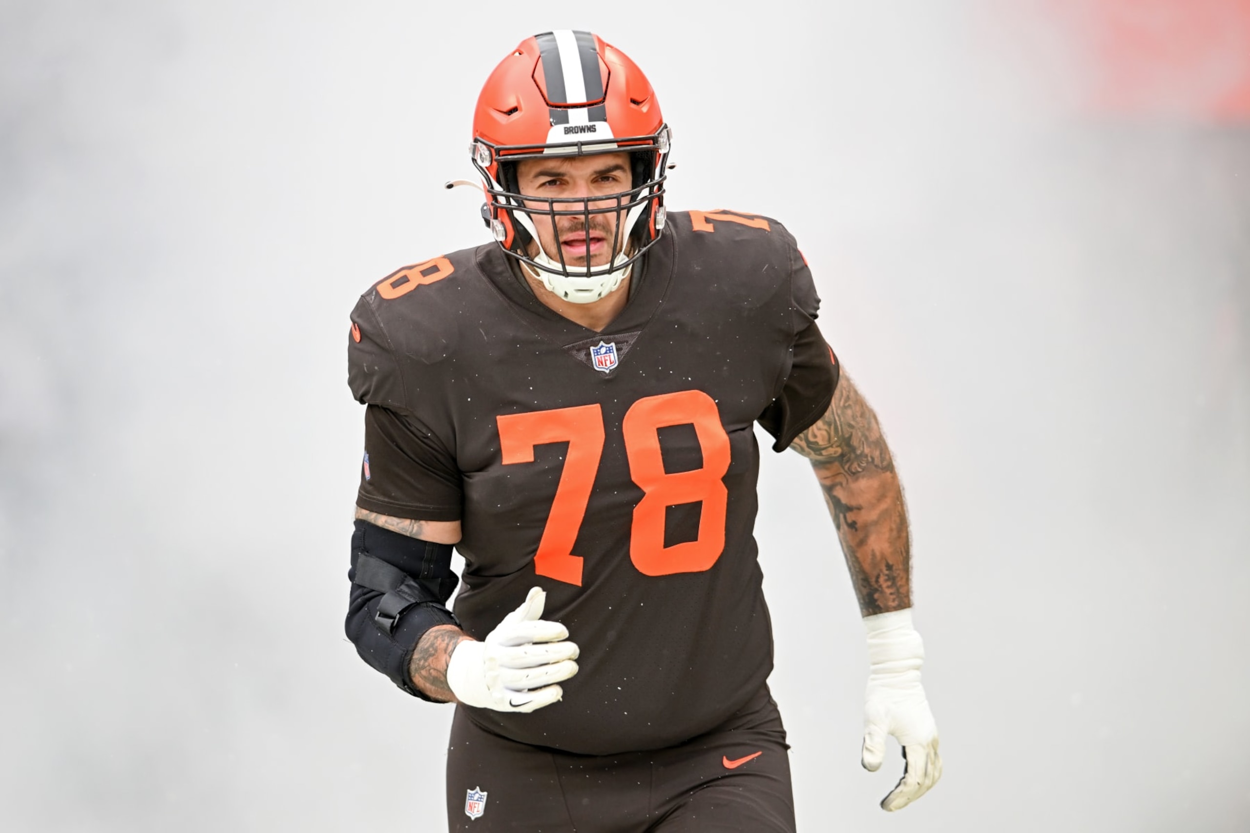 CLEVELAND, OHIO - DECEMBER 24: Jack Conklin #78 of the Cleveland Browns runs onto the field prior to a game against the New Orleans Saints at FirstEnergy Stadium on December 24, 2022 in Cleveland, Ohio. (Photo by Nick Cammett/Diamond Images via Getty Images)