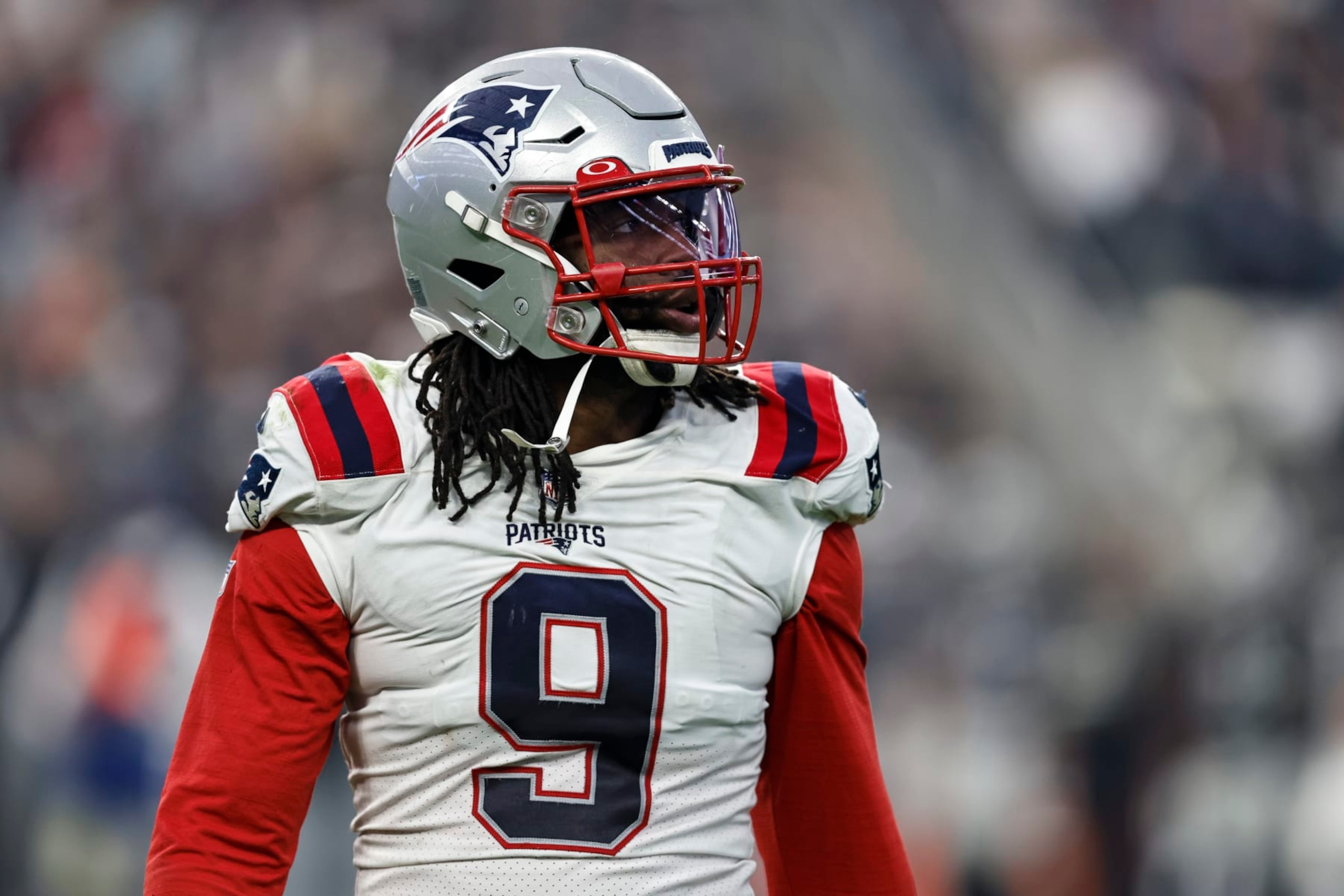 LAS VEGAS, NEVADA - DECEMBER 18: Matthew Judon #9 of the New England Patriots looks on during an NFL football game between the Las Vegas Raiders and the New England Patriots at Allegiant Stadium on December 18, 2022 in Las Vegas, Nevada. (Photo by Michael Owens/Getty Images)