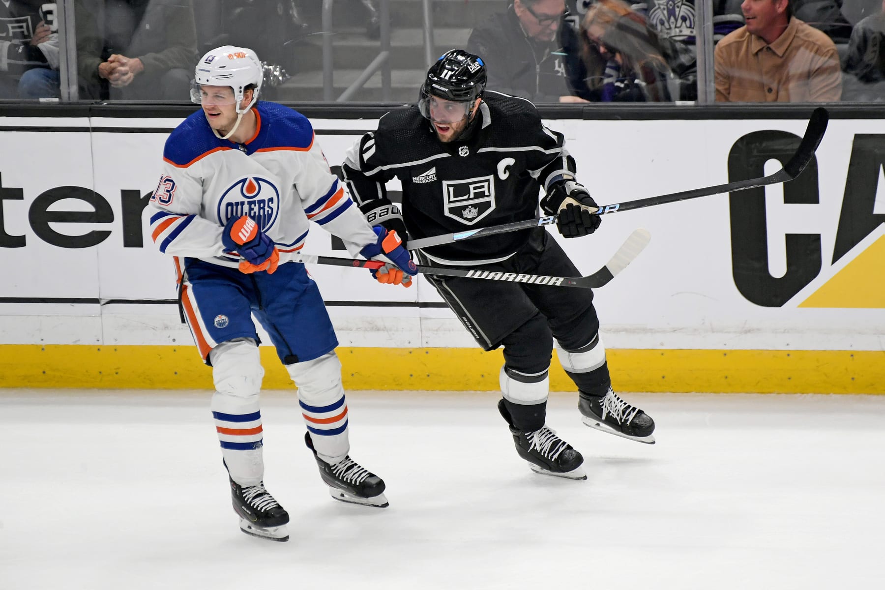 LOS ANGELES, CA - APRIL 28: Edmonton Oilers Winger Mattias Janmark (13) and Los Angeles Kings Center Anze Kopitar (11) turn towards the play during game four of the Western Conference First Round between the Edmonton Oilers and the Los Angeles Kings on April 28, 2024 at the Crypto.com Arena in Los Angeles, CA.  (Photo by Rob Curtis/Icon Sportswire via Getty Images)