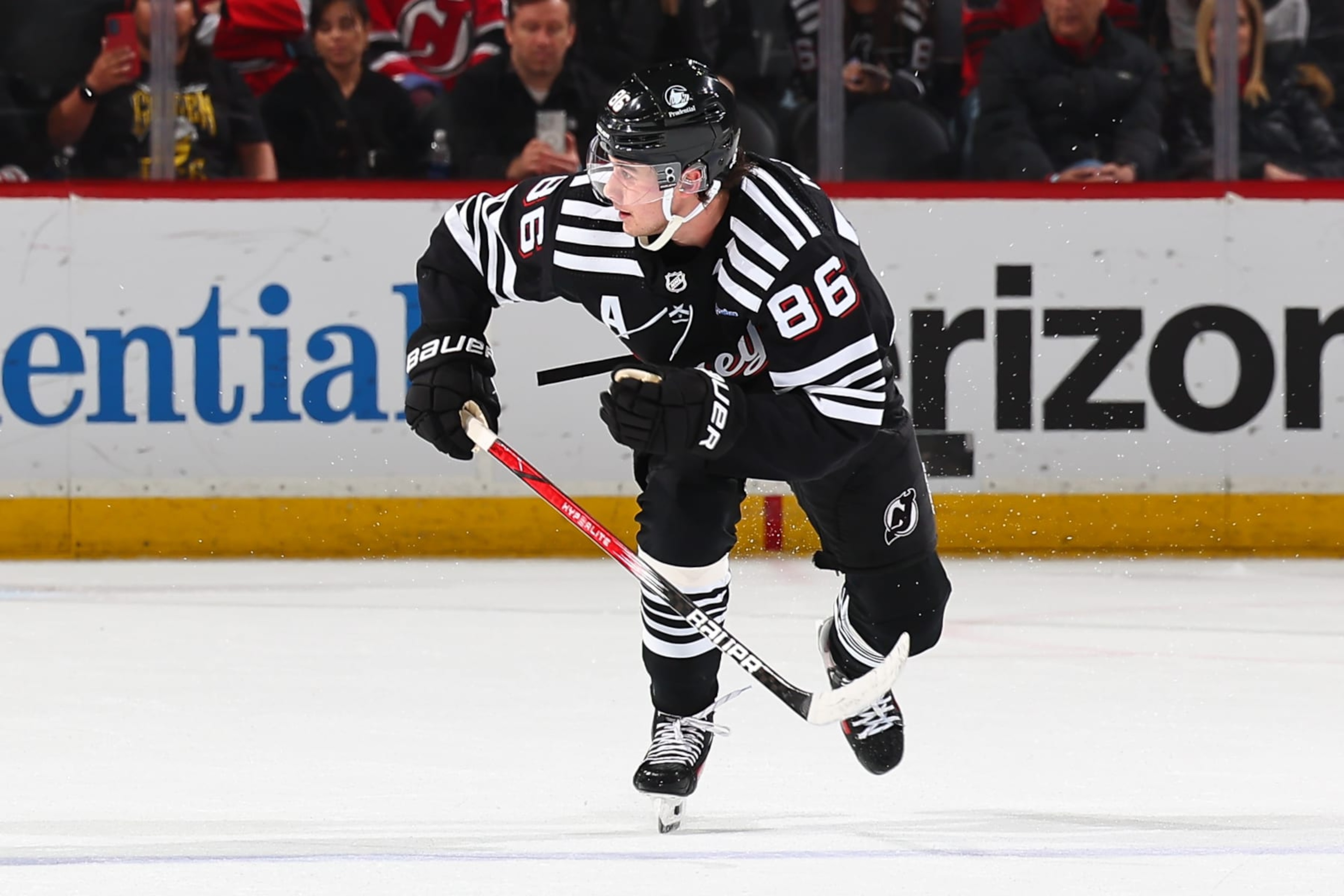 NEWARK, NJ - APRIL 07: Jack Hughes #86 of the New Jersey Devils skates during the overtime period against the Nashville Predators at the Prudential Center on April 7, 2024 in Newark, New Jersey.  (Photo by Rich Graessle/NHLI via Getty Images)