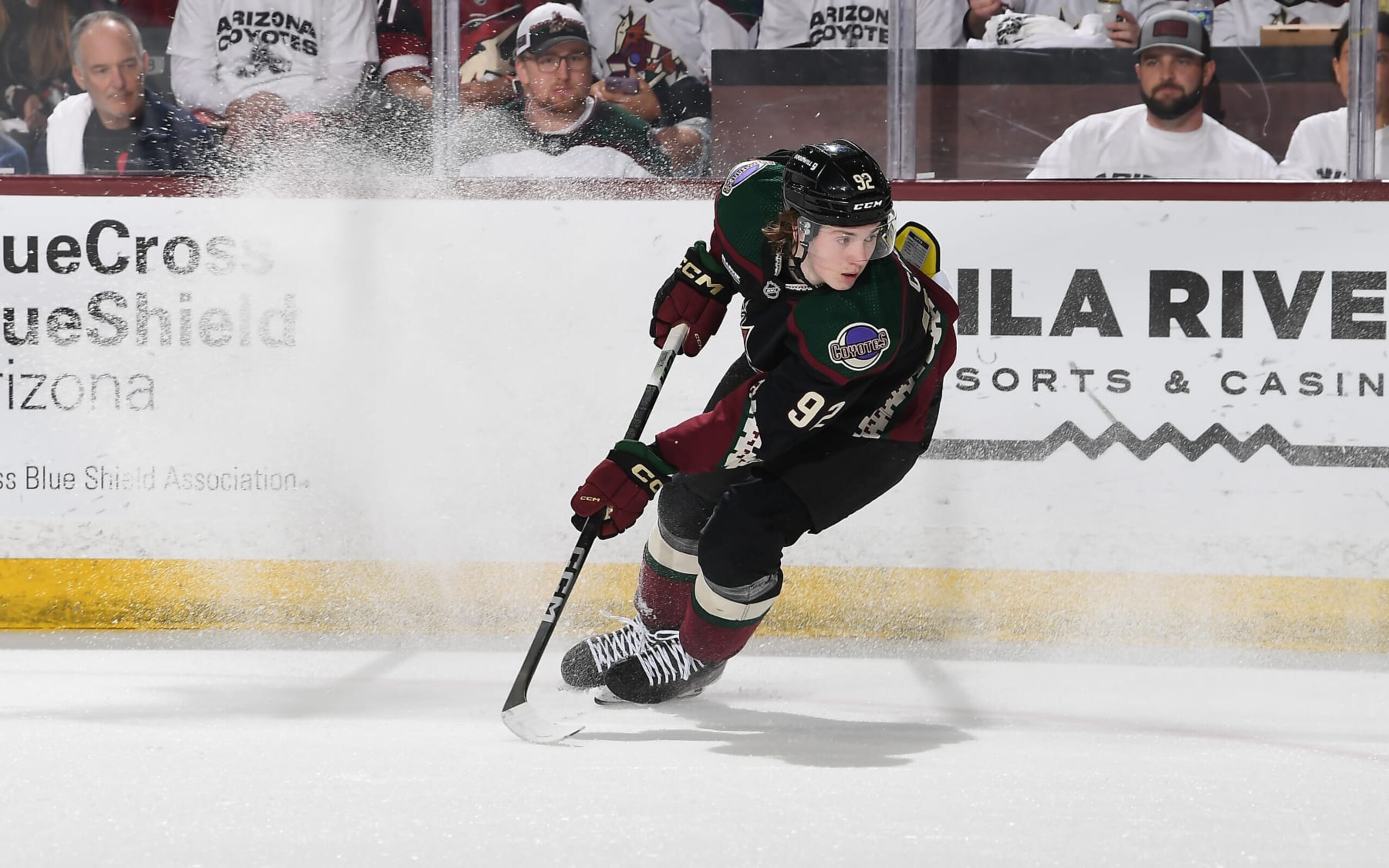 TEMPE, ARIZONA - APRIL 17: Logan Cooley #92 of the Arizona Coyotes skates with the puck against the Edmonton Oilers at Mullett Arena on April 17, 2024 in Tempe, Arizona. (Photo by Norm Hall/NHLI via Getty Images) TEMPE, ARIZONA - APRIL 17: Logan Cooley #92 of the Arizona Coyotes skates with the puck against the Edmonton Oilers at Mullett Arena on April 17, 2024 in Tempe, Arizona. (Photo by Norm Hall/NHLI via Getty Images)