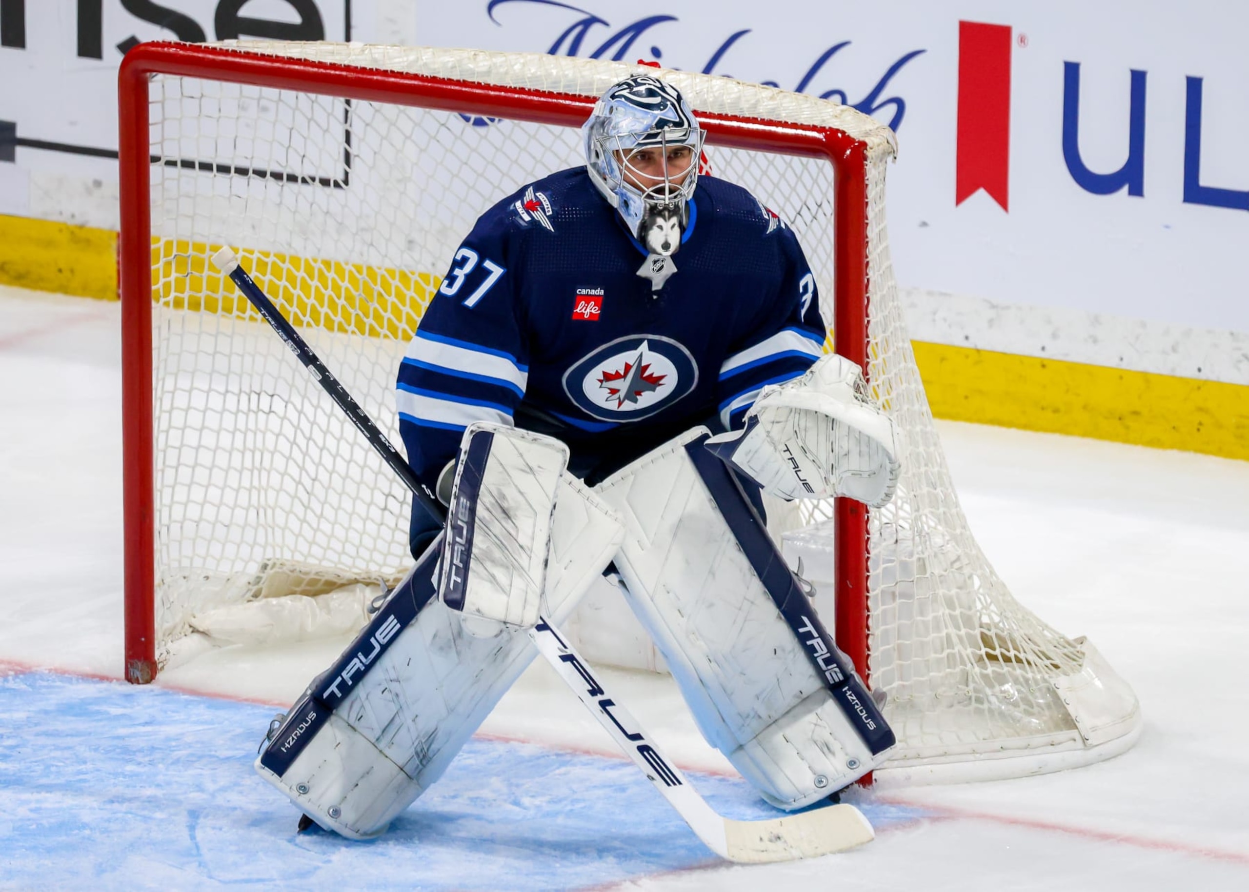 WINNIPEG, CANADA - APRIL 23: Goaltender Connor Hellebuyck #37 of the Winnipeg Jets guards the net during third period action against the Colorado Avalanche in Game Two of the First Round of the 2024 Stanley Cup Playoffs at Canada Life Centre on April 23, 2024 in Winnipeg, Manitoba, Canada. (Photo by Jonathan Kozub/NHLI via Getty Images) WINNIPEG, CANADA - APRIL 23: Goaltender Connor Hellebuyck #37 of the Winnipeg Jets guards the net during third period action against the Colorado Avalanche in Game Two of the First Round of the 2024 Stanley Cup Playoffs at Canada Life Centre on April 23, 2024 in Winnipeg, Manitoba, Canada. (Photo by Jonathan Kozub/NHLI via Getty Images)