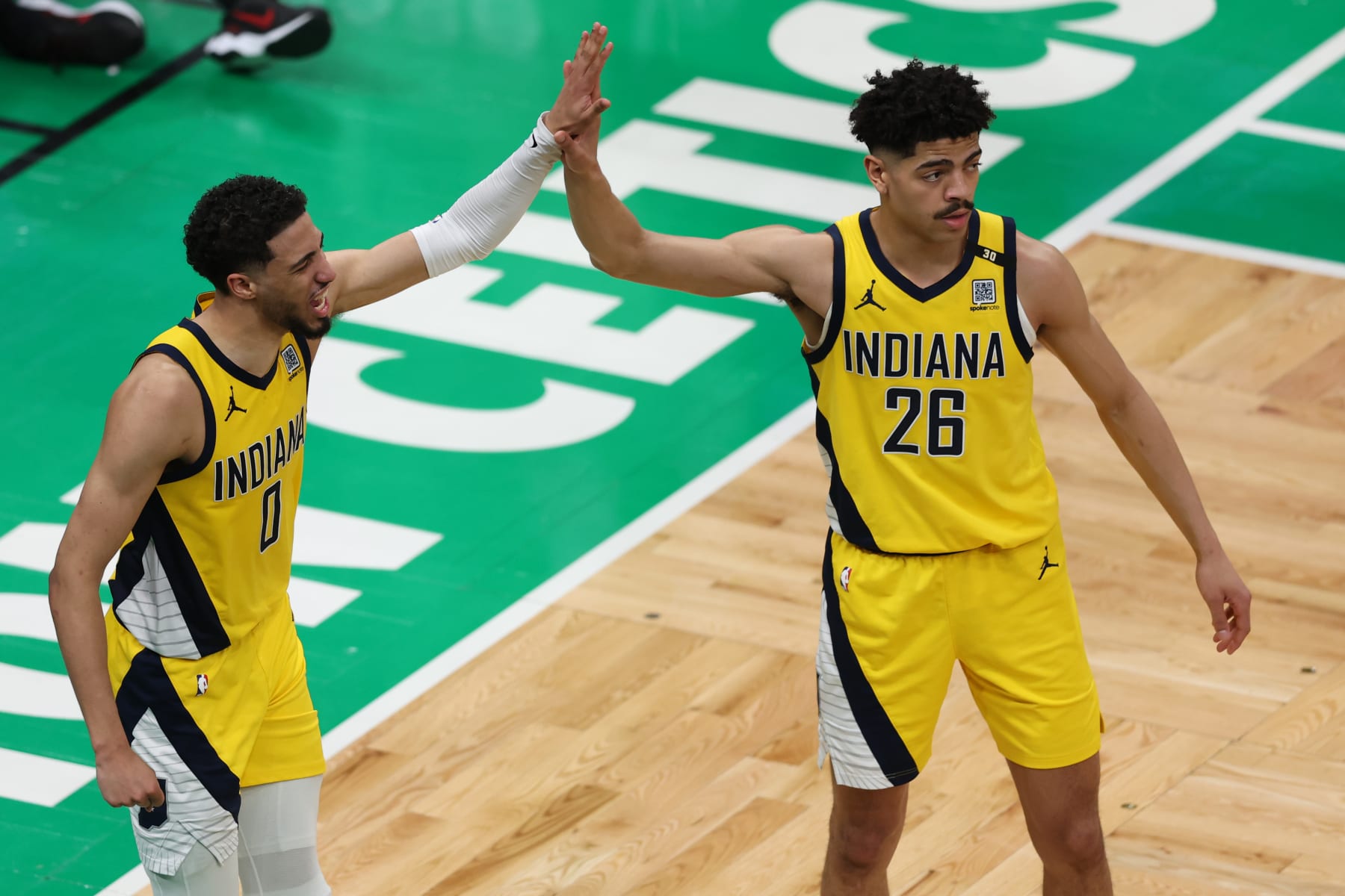 BOSTON, MASSACHUSETTS - MAY 21: Tyrese Haliburton #0 and Ben Sheppard #26 of the Indiana Pacers react during the third quarter against the Boston Celtics in Game One of the Eastern Conference Finals at TD Garden on May 21, 2024 in Boston, Massachusetts. NOTE TO USER: User expressly acknowledges and agrees that, by downloading and or using this photograph, User is consenting to the terms and conditions of the Getty Images License Agreement. (Photo by Adam Glanzman/Getty Images)