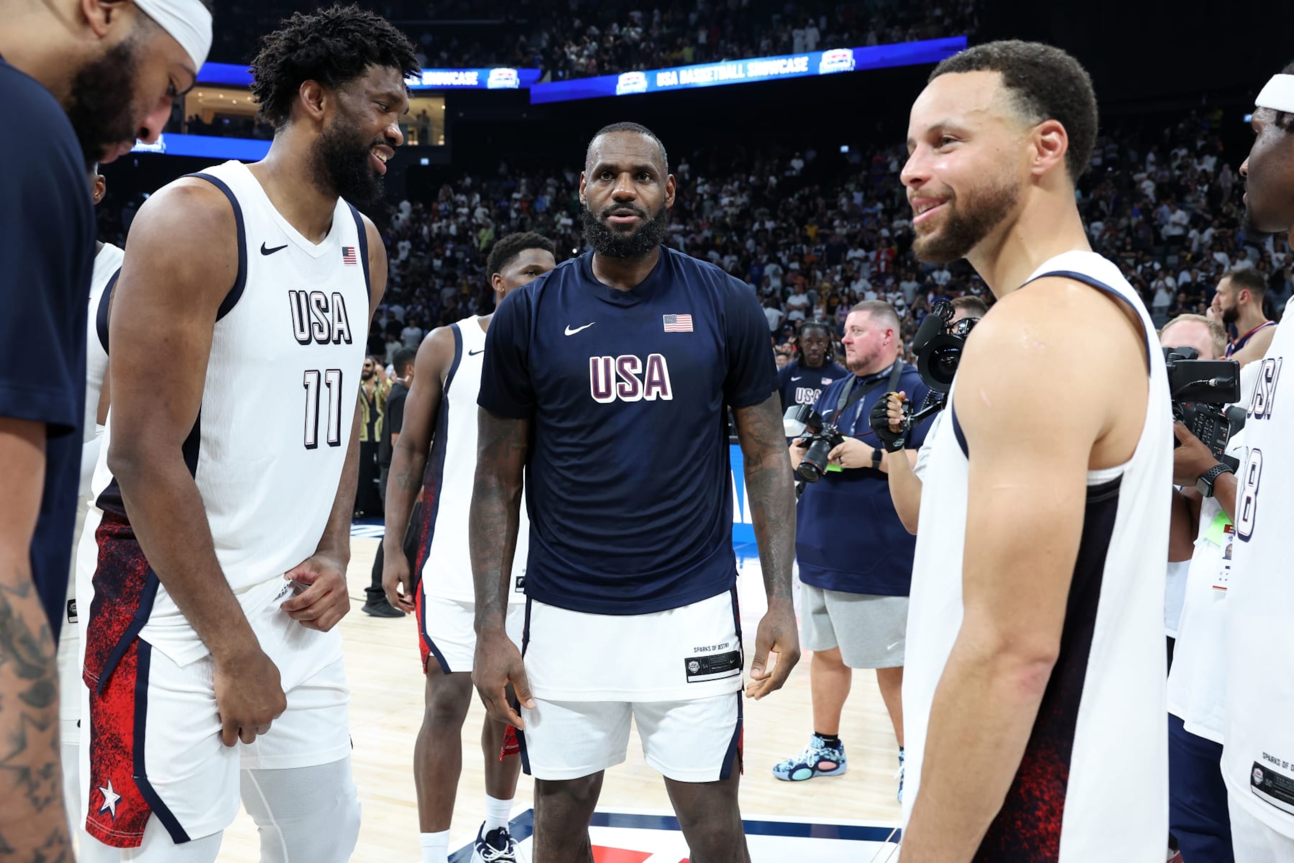 ABU DHABI, UNITED ARAB EMIRATES - JULY 17: Joel Embiid #11, LeBron James #6, Stephen Curry #4 and Derrick White #8 of the United States after an exhibition game between the United States and Serbia ahead of the Paris Olympic Games at Etihad Arena on July 17, 2024 in Abu Dhabi, United Arab Emirates. (Photo by Christopher Pike/Getty Images) ABU DHABI, UNITED ARAB EMIRATES - JULY 17: Joel Embiid #11, LeBron James #6, Stephen Curry #4 and Derrick White #8 of the United States after an exhibition game between the United States and Serbia ahead of the Paris Olympic Games at Etihad Arena on July 17, 2024 in Abu Dhabi, United Arab Emirates. (Photo by Christopher Pike/Getty Images)