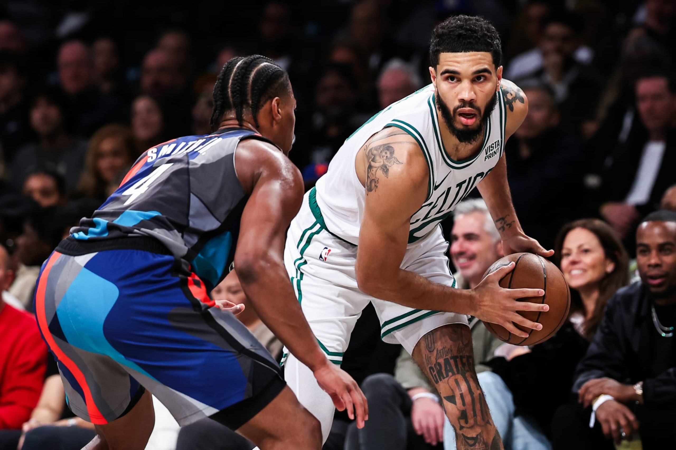 NEW YORK, NEW YORK - NOVEMBER 04: Jayson Tatum #0 of the Boston Celtics looks on while guarded by Dennis Smith Jr. #4 of the Brooklyn Nets during the fourth quarter of the game at Barclays Center on November 04, 2023 in New York City. NOTE TO USER: User expressly acknowledges and agrees that, by downloading and or using this photograph, User is consenting to the terms and conditions of the Getty Images License Agreement. (Photo by Dustin Satloff/Getty Images)