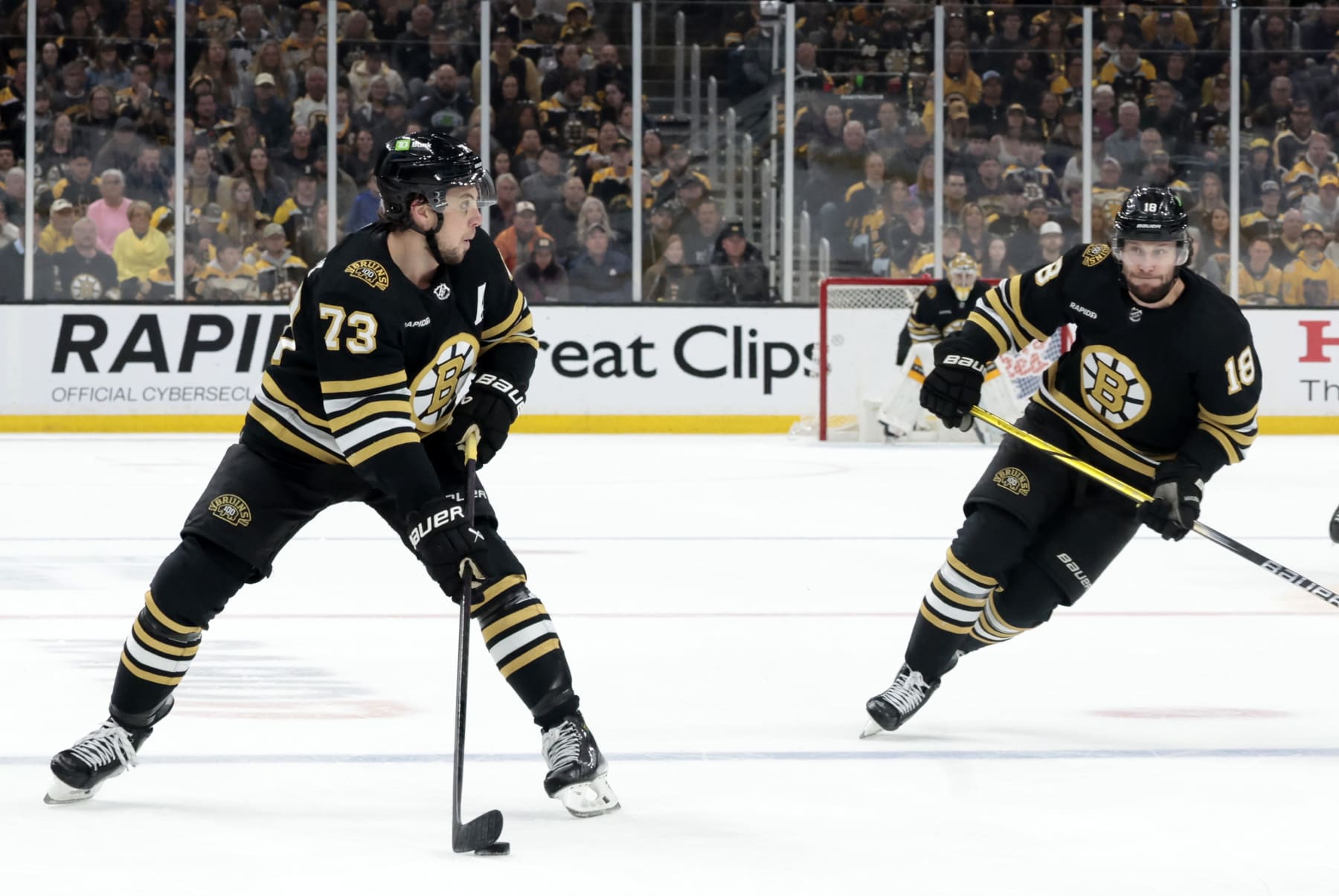 BOSTON, MA - MAY 12: Boston Bruins right defenseman Charlie McAvoy (73) holds the puck and gains the blue line during Game 4 of the Eastern Conference Second Round playoffs between the Boston Bruins and the Florida Panthers  on May 12 2024, at TD Garden in Boston, Massachusetts.(Photo by Fred Kfoury III/Icon Sportswire via Getty Images)