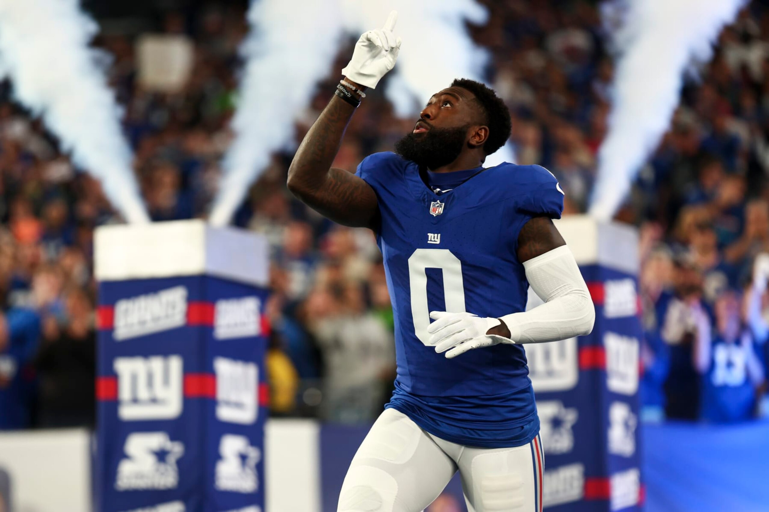 EAST RUTHERFORD, NJ - OCTOBER 2: Parris Campbell #0 of the New York Giants runs out of the tunnel prior to an NFL football game against the Seattle Seahawks at MetLife Stadium on October 2, 2023 in East Rutherford, New Jersey. (Photo by Kevin Sabitus/Getty Images)