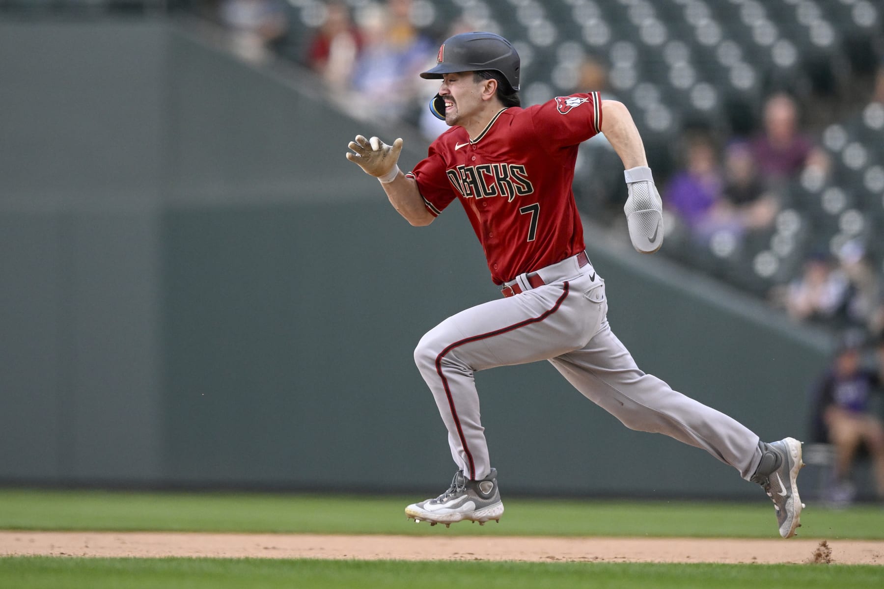 DENVER, CO - AUGUST 16: Arizona Diamondbacks Outfield Corbin Carroll (7) steals second base during a MLB game between the Colorado Rockies and Arizona Diamondbacks on August 16, 2023, at Coors Field in Denver, CO. (Photo by Nick Wosika/Icon Sportswire via Getty Images)