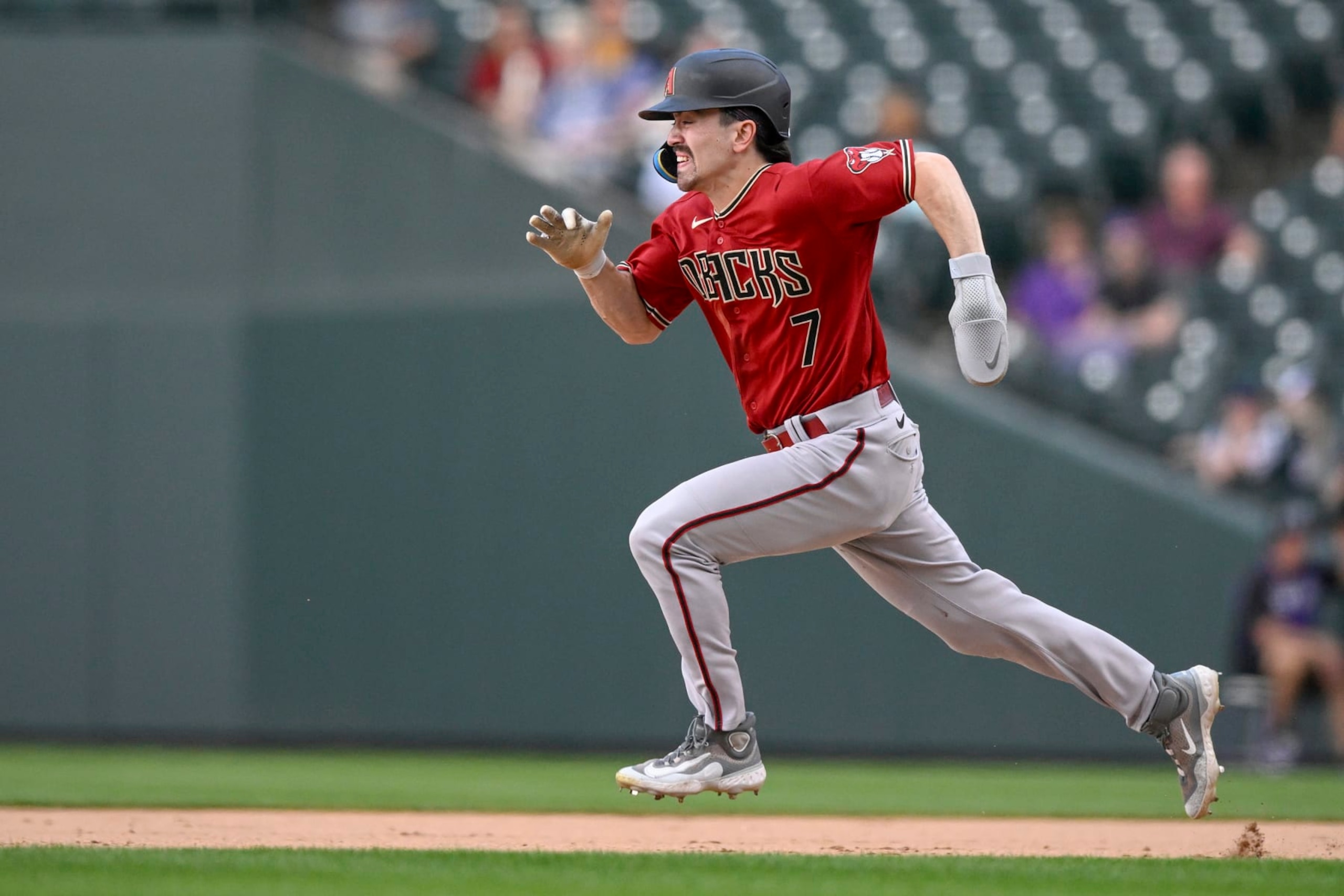 DENVER, CO - AUGUST 16: Arizona Diamondbacks Outfield Corbin Carroll (7) steals second base during a MLB game between the Colorado Rockies and Arizona Diamondbacks on August 16, 2023, at Coors Field in Denver, CO. (Photo by Nick Wosika/Icon Sportswire via Getty Images)