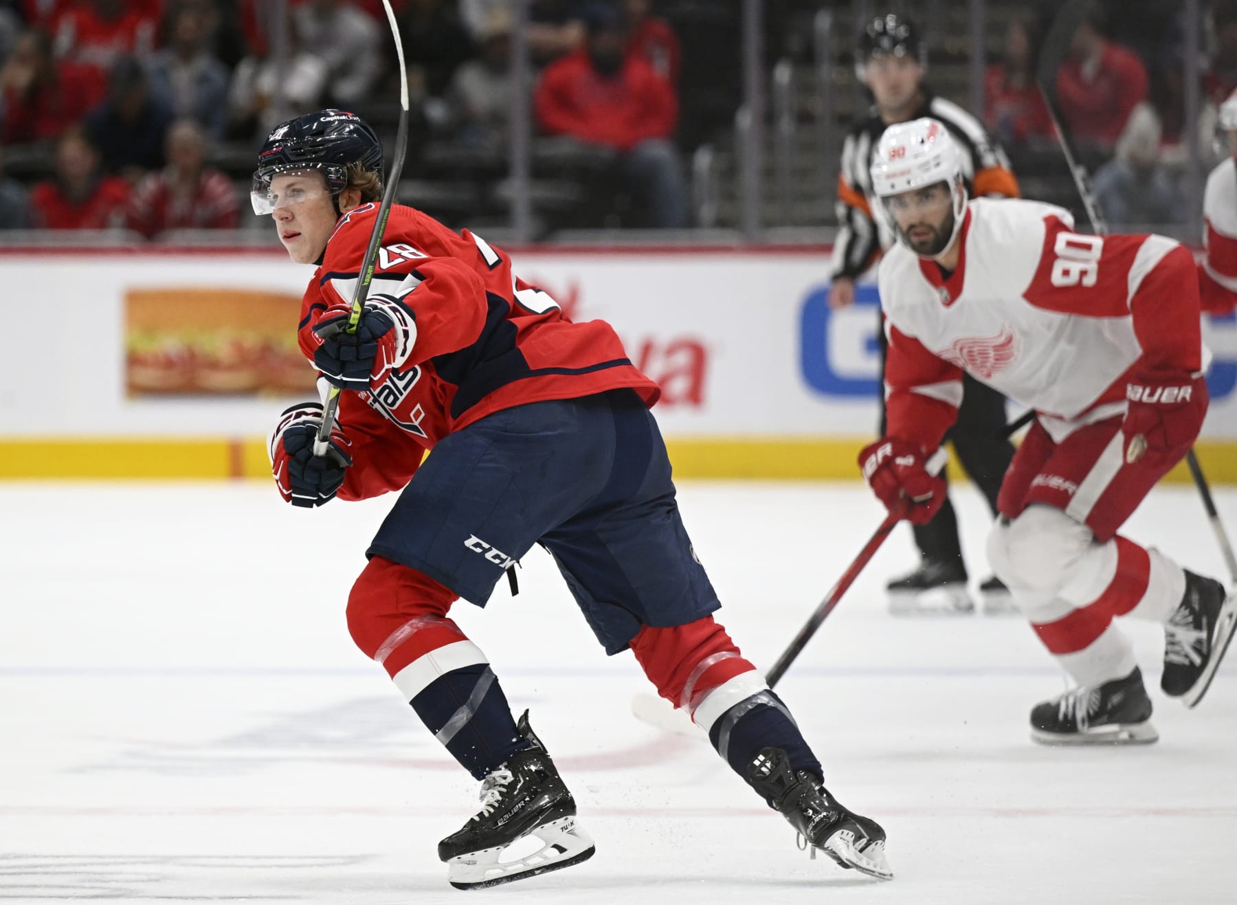WASHINGTON, DC - SEPTEMBER 28: Washington Capitals 18 year old recruit Andrew Cristall (28), left,  plays in an evening exhibition game against  the Detroit Redwings at the Capital one Arena in Washington DC, on September 28, 2023. (Photo by John McDonnell/The Washington Post via Getty Images)
