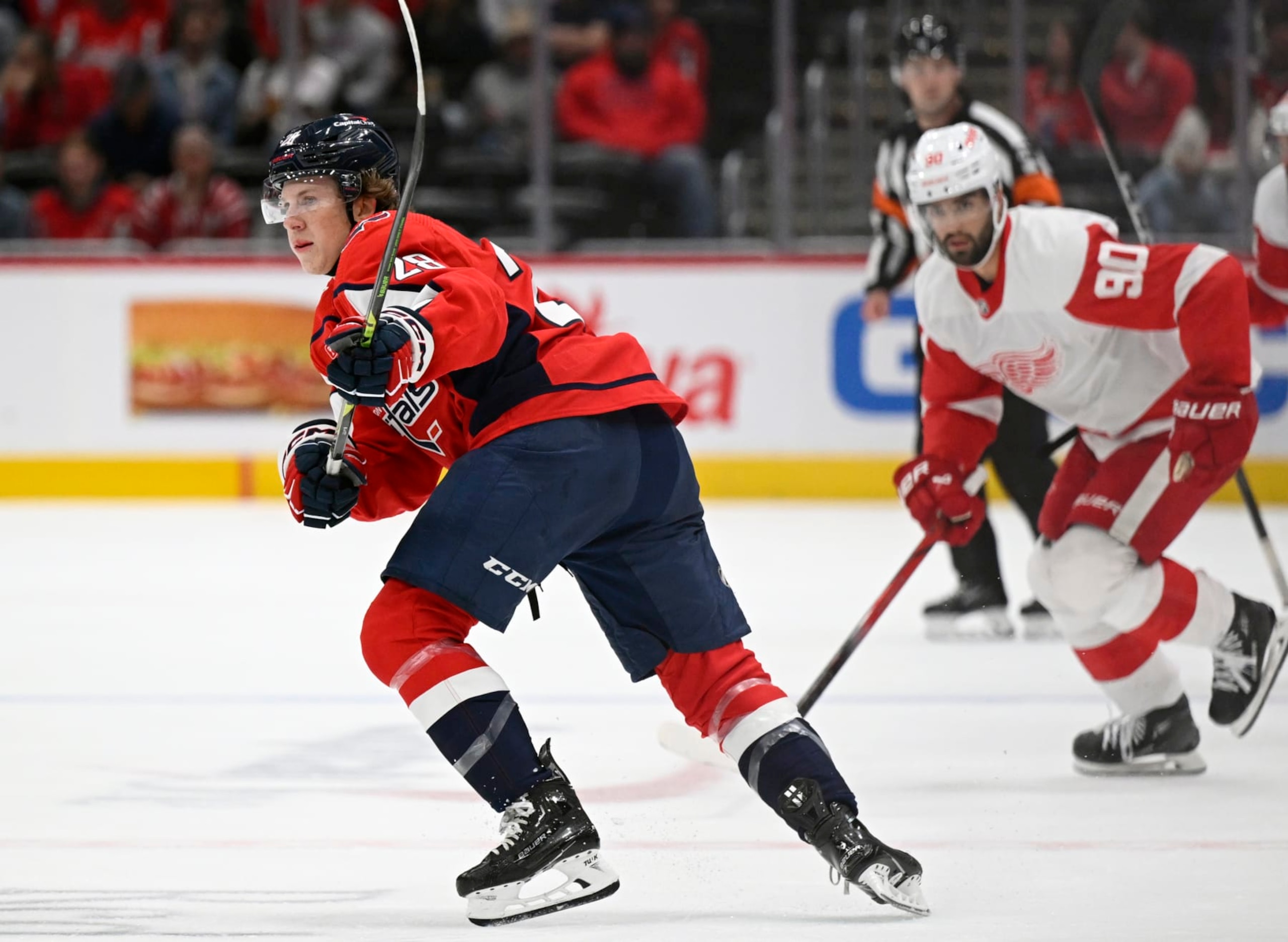 WASHINGTON, DC - SEPTEMBER 28: Washington Capitals 18 year old recruit Andrew Cristall (28), left,  plays in an evening exhibition game against  the Detroit Redwings at the Capital one Arena in Washington DC, on September 28, 2023. (Photo by John McDonnell/The Washington Post via Getty Images)