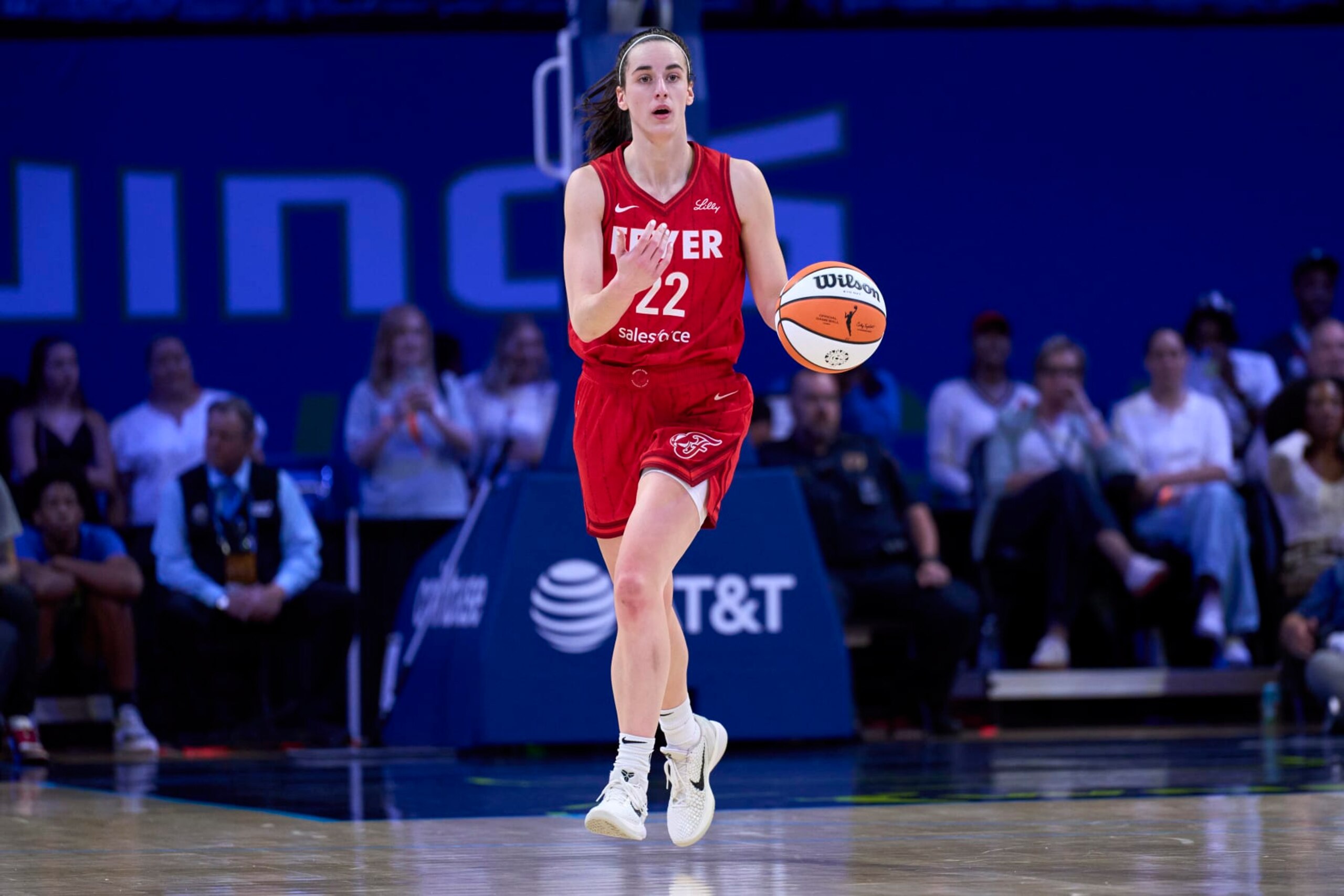 ARLINGTON, TEXAS - JULY 17: Caitlin Clark #22 of the Indiana Fever brings the ball up court against the Dallas Wings at the College Park Center on July 17, 2024 in Arlington, Texas. NOTE TO USER: User expressly acknowledges and agrees that, by downloading and or using this photograph, User is consenting to the terms and conditions of the Getty Images License Agreement. (Photo by Cooper Neill/Getty Images) ARLINGTON, TEXAS - JULY 17: Caitlin Clark #22 of the Indiana Fever brings the ball up court against the Dallas Wings at the College Park Center on July 17, 2024 in Arlington, Texas. NOTE TO USER: User expressly acknowledges and agrees that, by downloading and or using this photograph, User is consenting to the terms and conditions of the Getty Images License Agreement. (Photo by Cooper Neill/Getty Images)