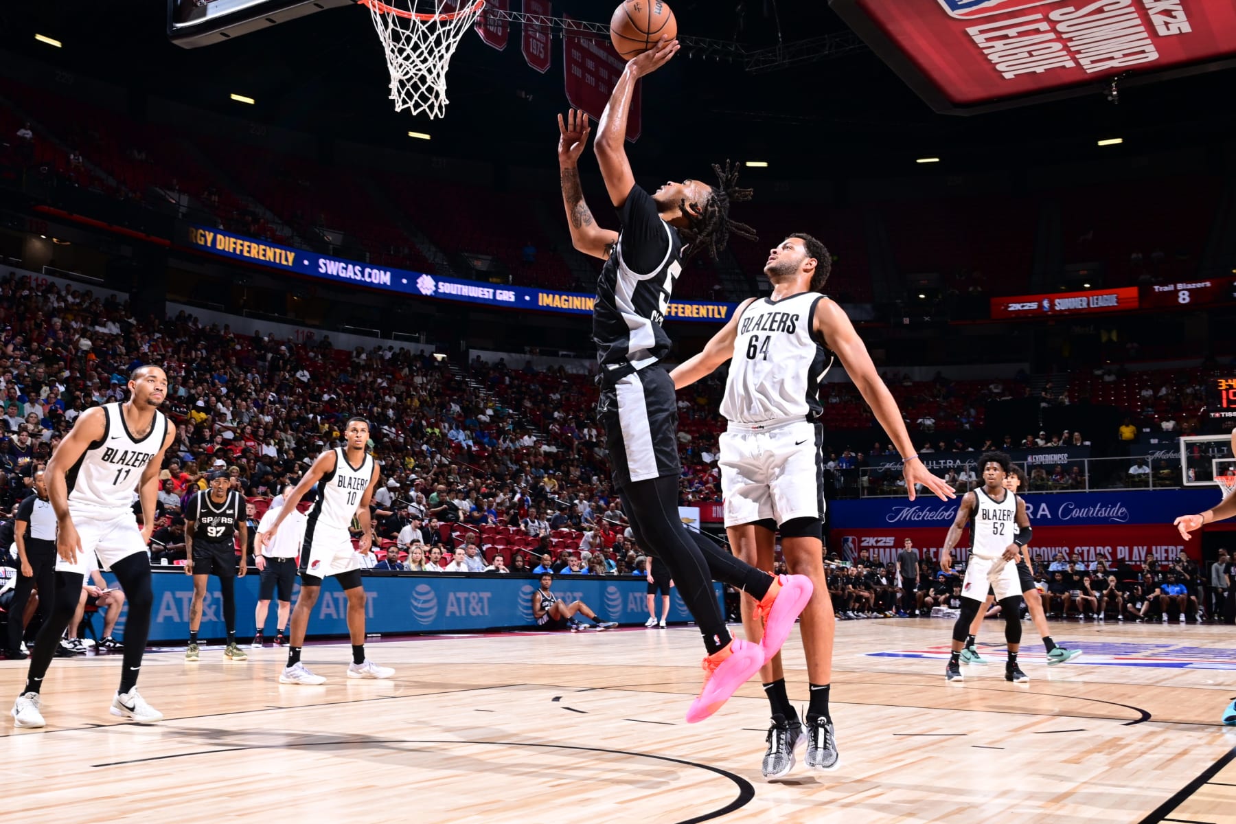 LAS VEGAS, NV - JULY 13: Stephon Castle #5 of the San Antonio Spurs shoots the ball during the game against the Portland Trail Blazers on July 13, 2024 at the Thomas & Mack Center in Las Vegas, Nevada. NOTE TO USER: User expressly acknowledges and agrees that, by downloading and or using this photograph, User is consenting to the terms and conditions of the Getty Images License Agreement. Mandatory Copyright Notice: Copyright 2024 NBAE (Photo by Adam Hagy/NBAE via Getty Images)