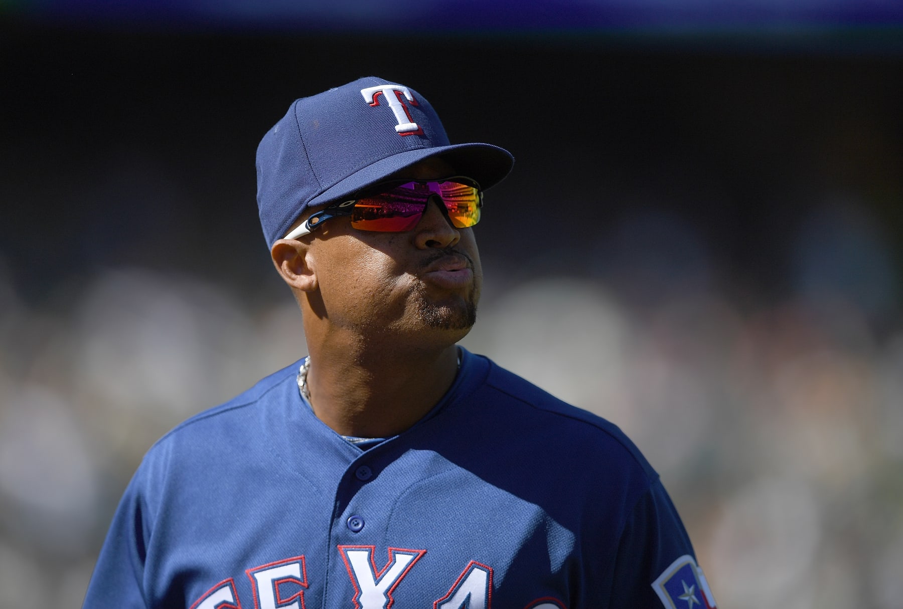 OAKLAND, CA - SEPTEMBER 09:  Adrian Beltre #29 of the Texas Rangers wearing Oakley sunglasses looks on as he walks off the field at the end of the fifth inning against the Oakland Athletics at Oakland Alameda Coliseum on September 9, 2018 in Oakland, California.  (Photo by Thearon W. Henderson/Getty Images)