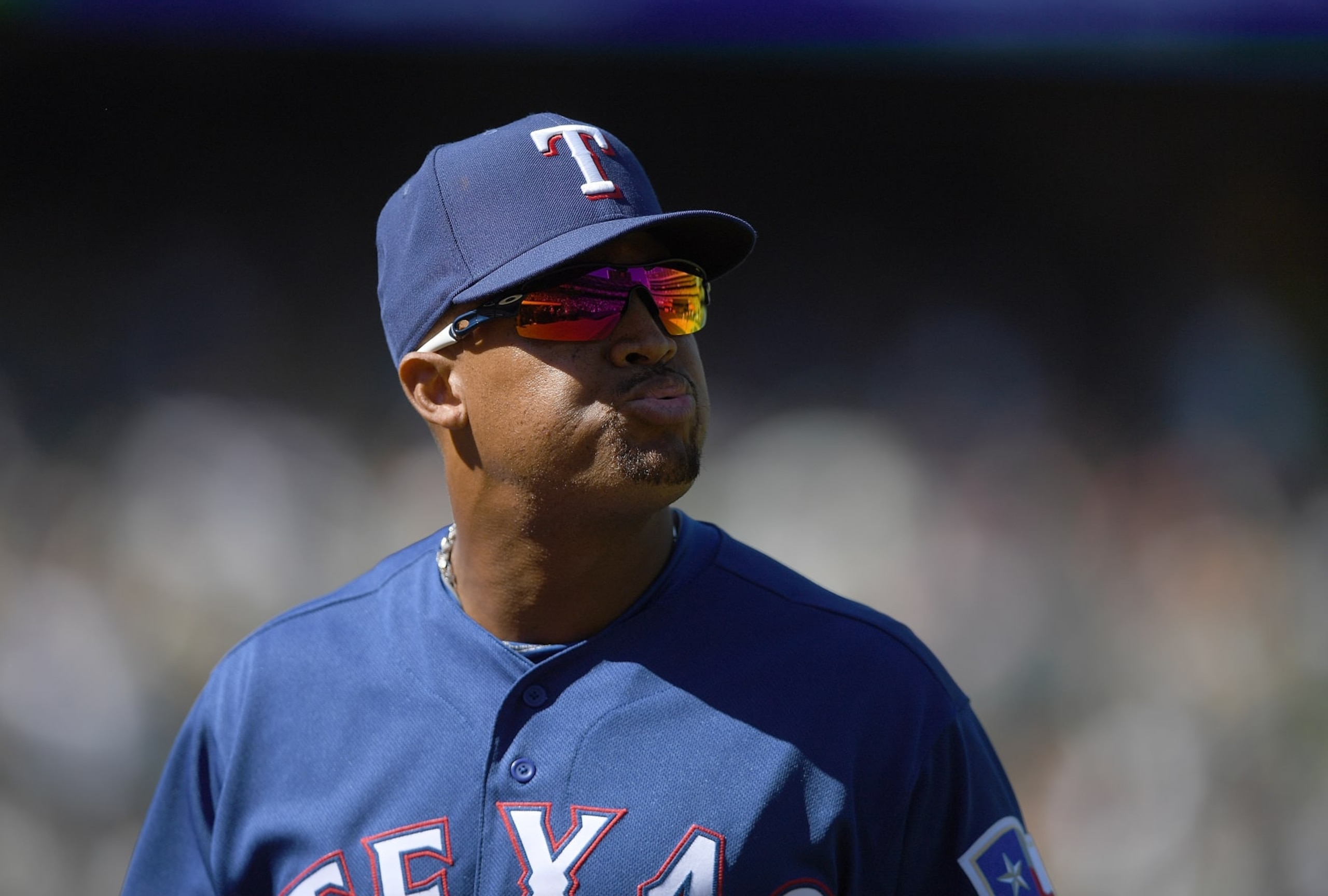 OAKLAND, CA - SEPTEMBER 09:  Adrian Beltre #29 of the Texas Rangers wearing Oakley sunglasses looks on as he walks off the field at the end of the fifth inning against the Oakland Athletics at Oakland Alameda Coliseum on September 9, 2018 in Oakland, California.  (Photo by Thearon W. Henderson/Getty Images)