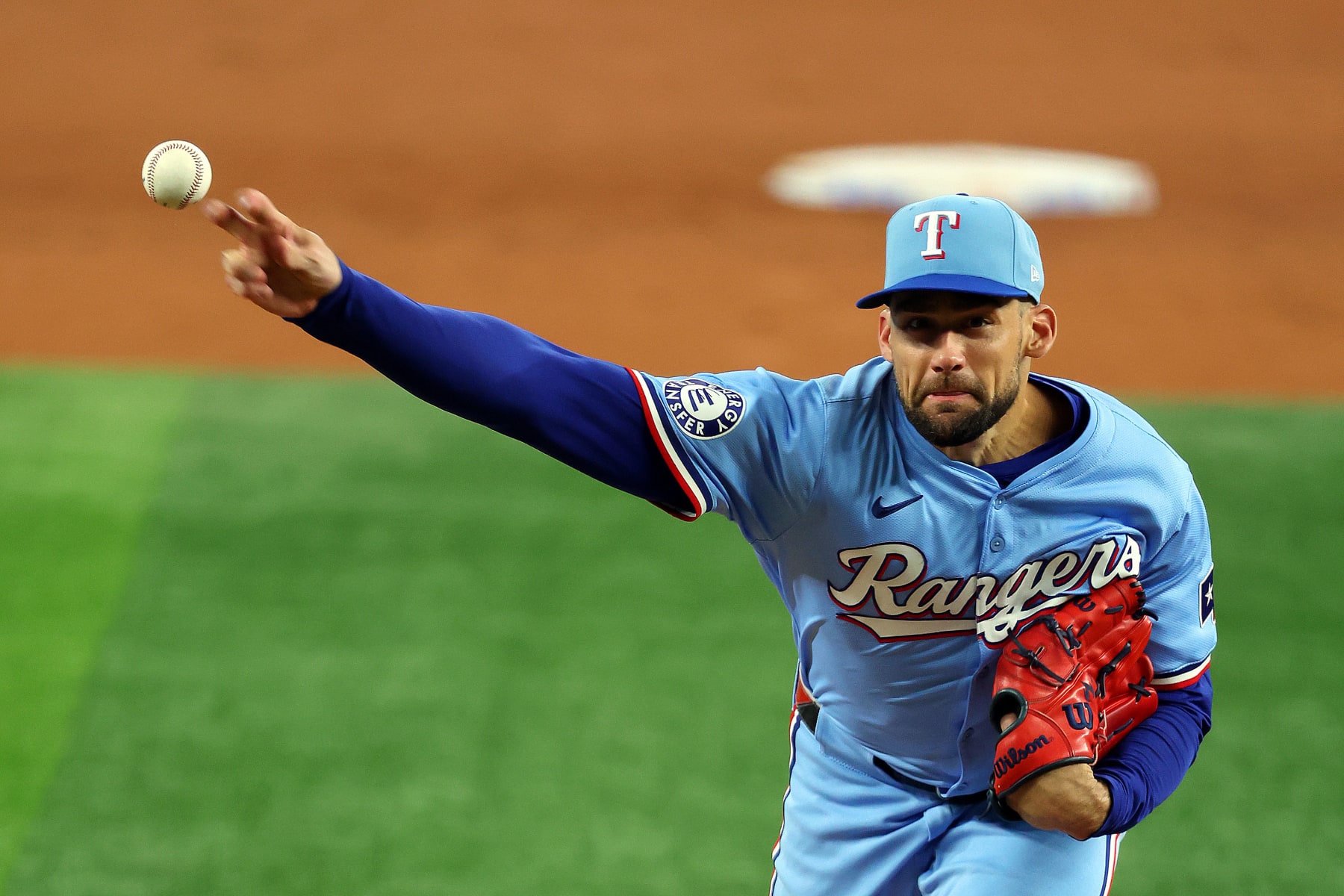 ARLINGTON, TEXAS - JULY 07: Nathan Eovaldi #17 of the Texas Rangers pitches against the Tampa Bay Rays at Globe Life Field on July 07, 2024 in Arlington, Texas. (Photo by Richard Rodriguez/Getty Images)