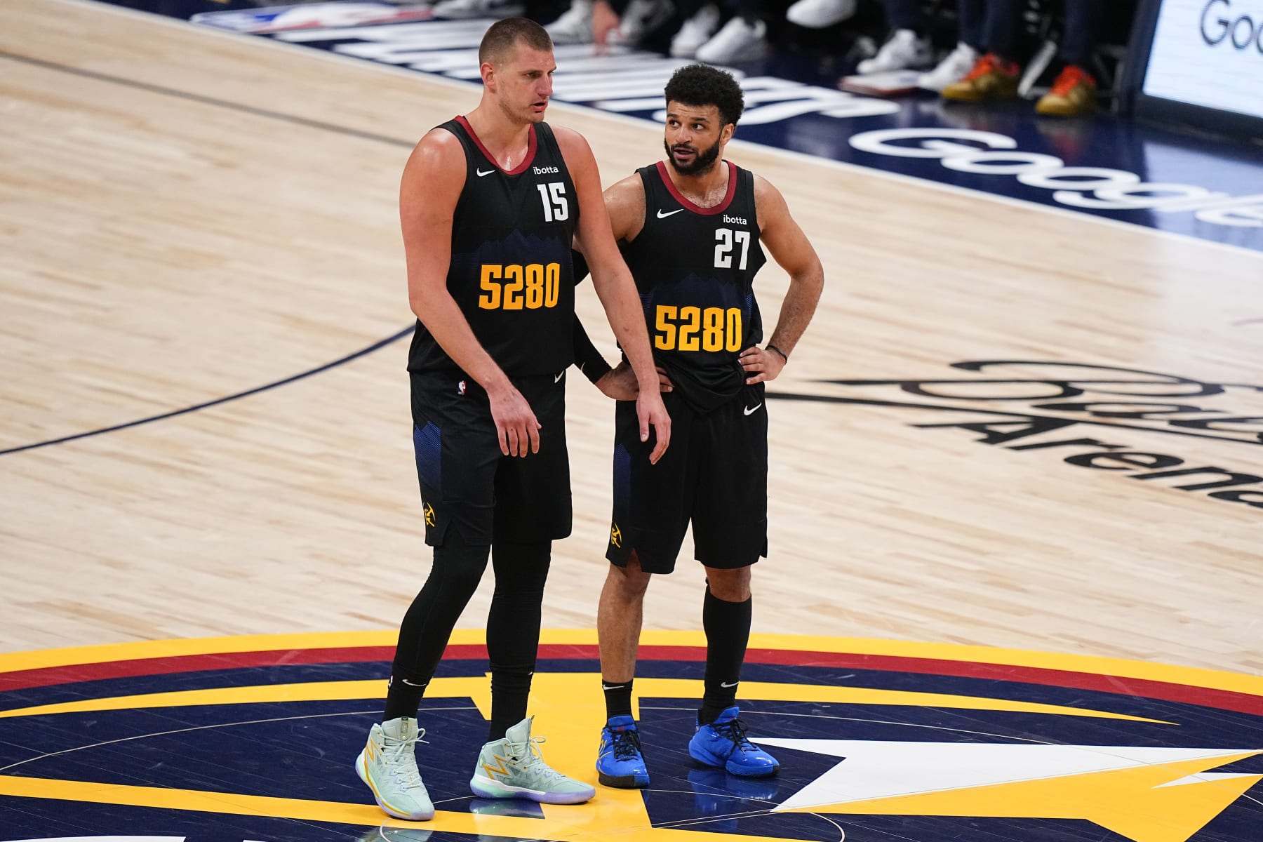DENVER, CO - MAY 19: Nikola Jokic #15 talks to Jamal Murray #27 of the Denver Nuggets during the game against the Minnesota Timberwolves during Round 2 Game 7 of the 2024 NBA Playoffs on May 19, 2024 at the Ball Arena in Denver, Colorado. NOTE TO USER: User expressly acknowledges and agrees that, by downloading and/or using this Photograph, user is consenting to the terms and conditions of the Getty Images License Agreement. Mandatory Copyright Notice: Copyright 2023 NBAE (Photo by Bart Young/NBAE via Getty Images)
